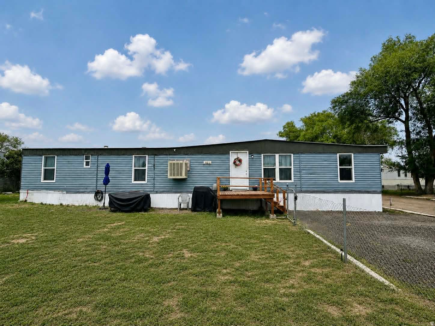 Charming 3 bed, 2 bath mobile home offering approximately 852 sq ft of comfortable living space! This well-kept home features an open-concept layout, a bright living room with plenty of natural light, and a kitchen with ample cabinet and counter space. The additional bedrooms offer flexibility for guests, office space, or hobbies. Outside, you'll find off-street parking, a storage shed, and a low-maintenance yard space. Conveniently located close to schools, parks, and local amenities, this home is a great opportunity for affordable homeownership or investment potential! Please note: This is a mobile home only sale- lot is not included. Current lot rent is $435/month.  Square footage figures are provided as a courtesy estimate only. Buyer is advised to obtain an independent measurement.
