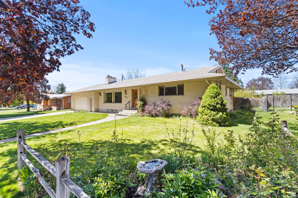 PRICE DROP! Located in the highly desirable community of River Heights, this home sits on a quiet, low-traffic street surrounded by mature trees and established landscaping. Enjoy the convenience of being within walking distance to elementary schools and city parks, with a short commute to Utah State University and downtown Logan. The home has been maintained with major updates already completed, including a newer roof, furnaces, air conditioning, and attic insulation for improved comfort and efficiency. Approximately 90% of the windows have been replaced within the past five years, adding to the home's energy efficiency and modern appeal. The property features two full kitchens-one upstairs and one downstairs-offering excellent flexibility for multi-generational living or a potential basement rental (buyer to verify city ordinances). Outside, you'll love the mature yard with fruit trees, flower beds, and inviting outdoor spaces. This walkable neighborhood combines peaceful living with close access to schools, parks, and everyday amenities.  Square footage figures are provided as a courtesy estimate only and were obtained from County Records  Buyer is advised to obtain an independent measurement.