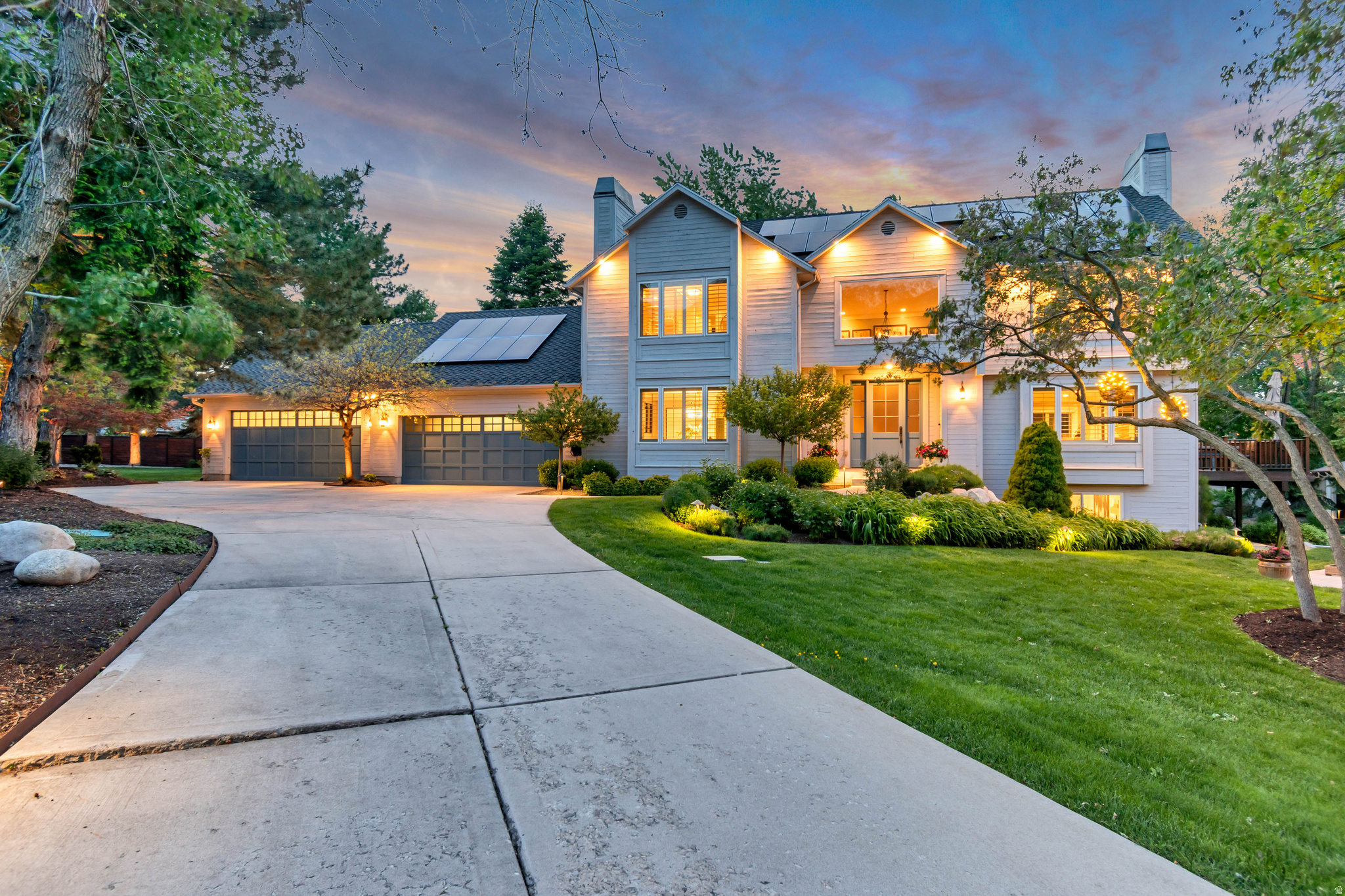 It looks to good to be true, but it is!!  The setting, the privacy, the views, the yard, everything.  Drive down your tree covered private drive and you will begin to see the magic happen.  This beautifully remodeled home sits on .84 acre lot that is magical.  Swimming pool, sport court, hot tub, decks, and an outdoor sauna set in the trees will entertain family for hours.  Top of the line finishes throughout the home.   stunning floor plan with Huge kitchen and family rooms with an abundance of windows and sunlight.  Home is immaculate and finished perfectly.  Master bedroom has views of the yard and mountains that are amazing.   Bedrooms are large and basement is finished and has windows above grade.    AMAZING!!!