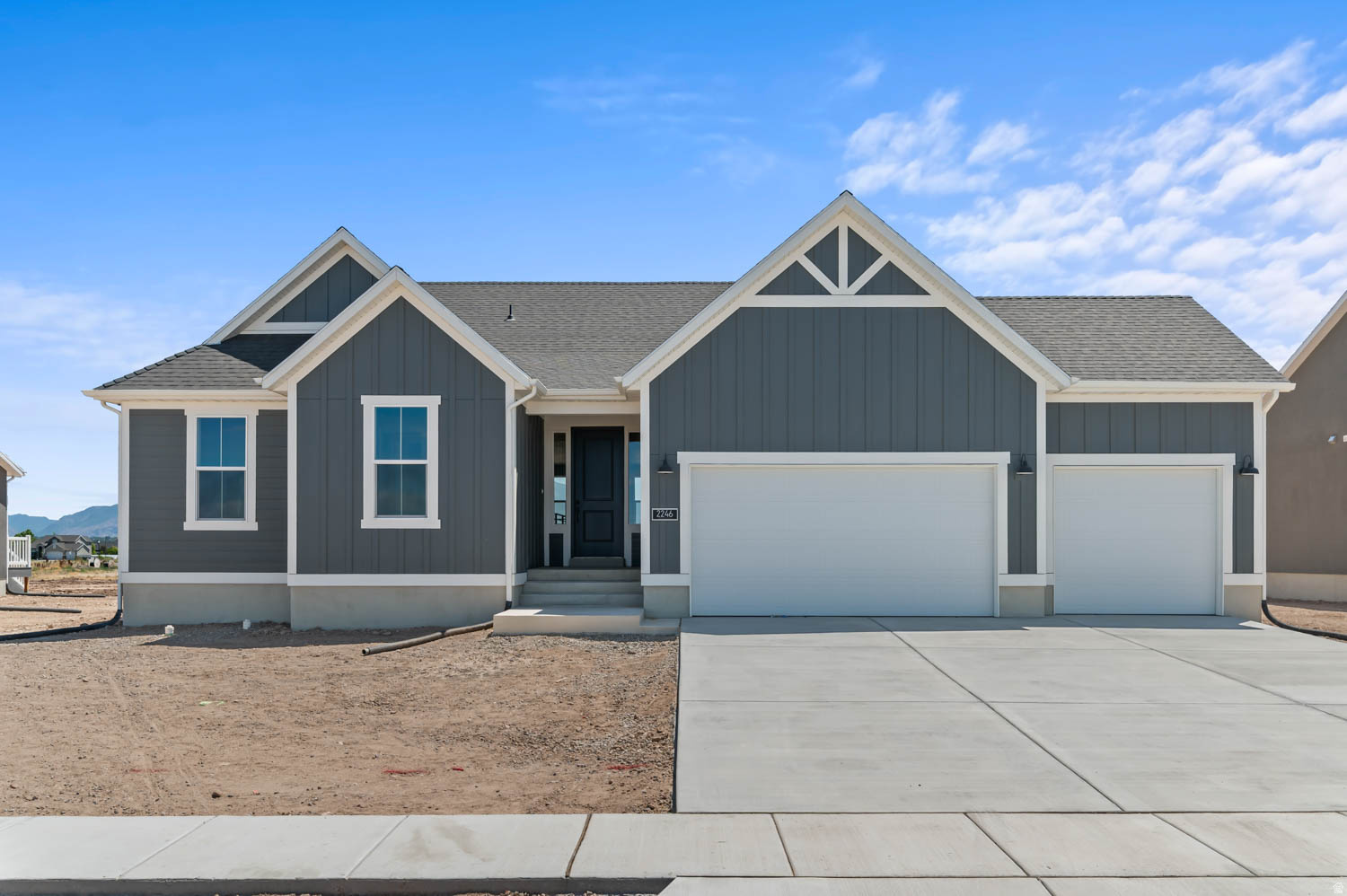 Come see this brand new 1825 Farmhouse home plan with thoughtfully designed living space, all in a great master planned community! Featured you will find a stylish kitchen with gray laminate cabinetry, tile backsplash, quartz countertops and upgraded platinum gas appliances. The interior showcases a well-balanced mix of laminate hardwood, tile, and carpet flooring, accented by recessed can lighting and elegant two-tone paint. A spacious 3-car garage with keypad entry and an exterior exit door adds convenience, while box windows in both the kitchen nook and owner's bedroom bring in natural light and architectural charm. Thoughtful upgrades include Christmas light outlets and an energy-efficient tankless water heater. Craftsman-style baseboards and casing add rich character throughout, complemented by a modern metal stair railing. The grand owner's bathroom features quartz surrounds with bold black matte hardware, creating a sleek and sophisticated finish. This home blends farmhouse warmth with modern design and everyday functionality!