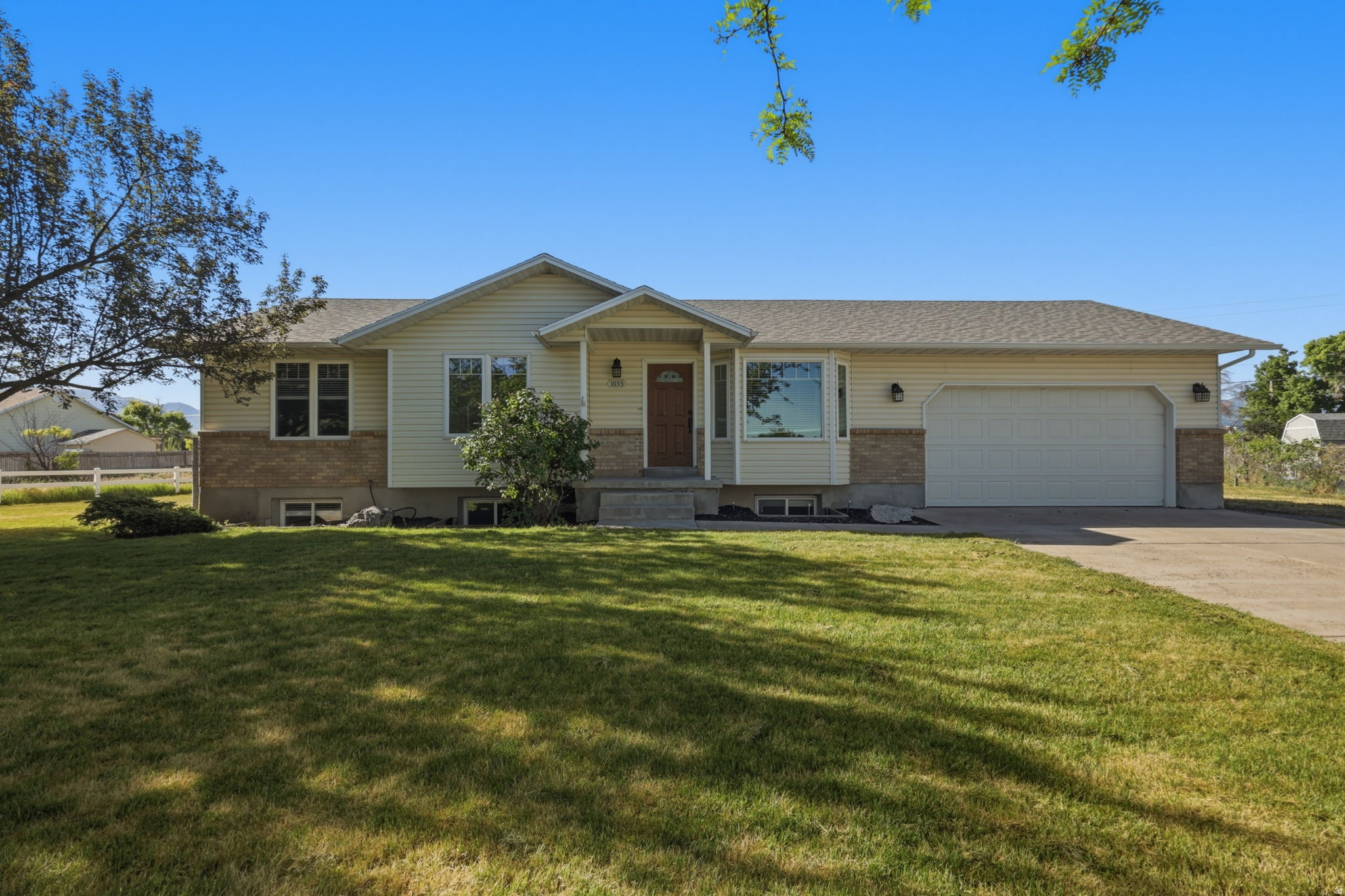 Big Lot + Basement Apartment! This is a unique opportunity to own a very functional property. This well cared for home in Hyrum sits on a 0.51 acre lot. The main floor features 3 bedrooms, 2 full bathrooms, a cozy living room, and a spacious kitchen and dining room. Downstairs is a 1242 SQFT 3 bedroom, 1 bathroom apartment with its own kitchen and sperate entrance. Perfect for family living with you or extra income. XL 2 car garage and plenty of space on the lot for campers, RVs, ETC... Brand new carpet, roof and paint; this home is 100% ready to go! Schedule a showing today!