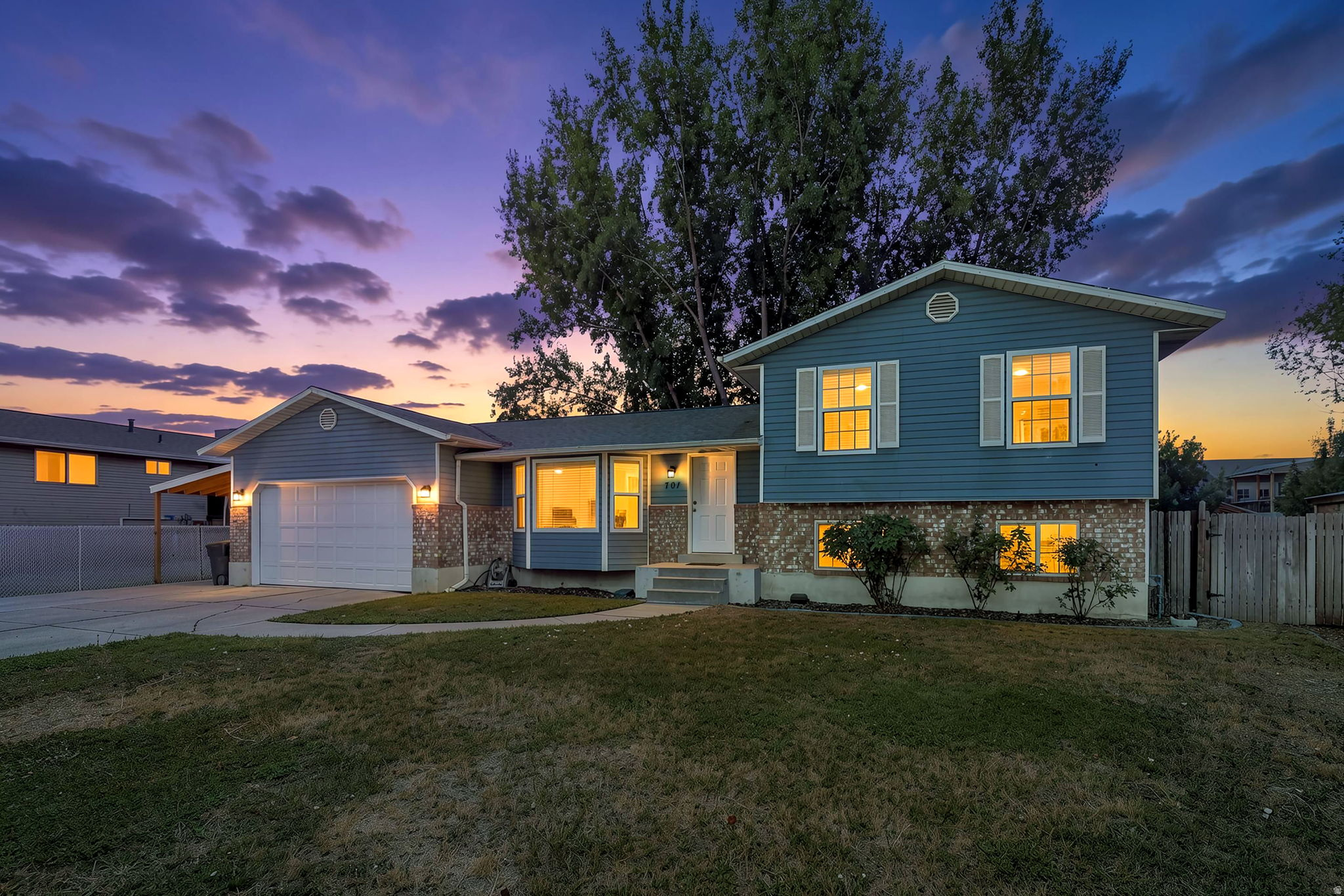 ***OPEN HOUSE Thursday, July 23rd 6-7 pm & Saturday, July 25th 12-1 pm***Beautifully maintained home featuring PAID-OFF SOLAR (2023), including NEW CARPET & numerous major updates, & SPACIOUS layout perfect for everyday living! The bright kitchen offers WHITE CABINETS, GRANITE COUNTERTOPS, STAINLESS STEEL appliances, GAS RANGE, & generously sized PANTRY. Recent updates: AC (2019), FURNACE (approx. 2020), ROOF (approx. 2024), & PAID-OFF SOLAR (2023) & NEW CAN LIGHTING in kitchen, living room, & basement family room. Main level offers beautiful BAY WINDOW that fills the home with natural light, half bath, & large laundry room. Primary suite upstairs with walk-in closet & private bathroom. FULLY FINISHED basement features LARGE family room, an additional bedroom, half bath, & ENORMOUS crawl space providing incredible STORAGE. ENJOY the FULLY FENCED, FLAT BACKYARD w/AUTO SPRINKLERS, mature trees, patio, & PLAYSET perfect for ENTERTAINING. Parking is plentiful w/2-CAR GARAGE plus attached 1-CAR CARPORT. LOCATION!  MINUTES to I-15, Provo airport, Provo Mall, shopping, BYU, schools & churches. Buyer/agent to verify all information, square footage per tax records.