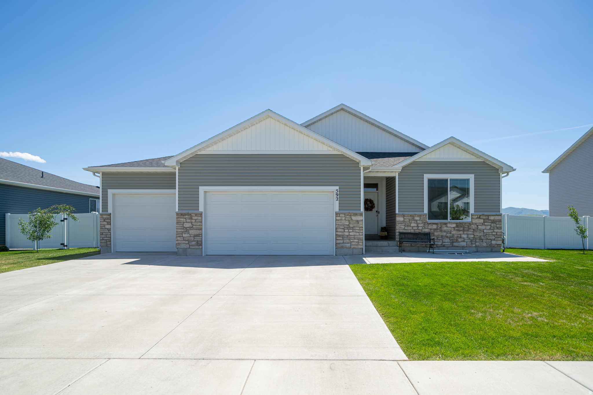 Stunning 6-bedroom home on the beautiful south end of Cache Valley. Discover the perfect blend of space and function in this fully finished 3,150 sq. ft. home. Boasting 6 spacious bedrooms and 3 baths.  Huge 4 car garage offers abundant storage for all your gear. Situated on a large, fully fenced lot,  the yard features auto sprinklers, oversize patio and varieties of young fruit trees, still with plenty of room to play. Located minutes from grocery and hardware store, Hyrum State Park and Reservoir for boating and fishing, plus premier hiking, biking, and one of the West's top skate parks with lighted pickleball and splash pad and dog park. Your ultimate outdoor lifestyle starts here!