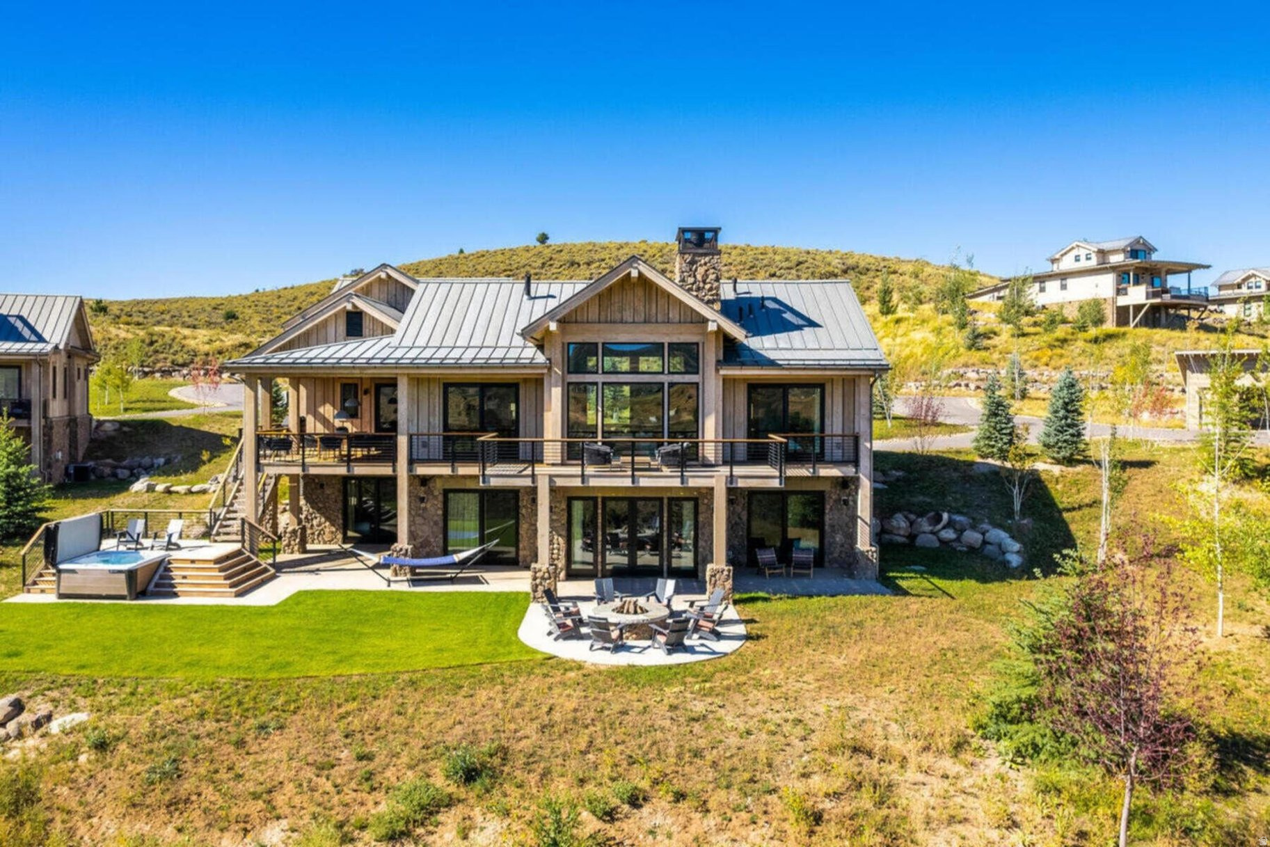 Enjoy the ease of ownership at Victory Ranch with this 1/8th fractional 5-bedroom, 5.5 bath Kingfisher cabin.  Showcasing a modern-meets-rustic aesthetic with designer finishes, this beautiful 3800 square foot stand-alone cabin home sleeps 12 and includes 2 patios, a 6-person hot-tub, a fire pit, and outdoor covered dining. You will enjoy 3 winter weeks and 3 summer weeks at Victory Ranch, a private, four-season community set amidst 6,250 acres along a four-mile stretch of the Upper Provo River, just 15 minutes from Park City and Deer Valley.  The Residence Club owners have coveted access to Victory Ranches 18-hole Rees Jones golf course, world-class fly fishing, 20 miles of hiking and biking trails, 5-stand shooting facility, backcountry yurts, two-acre lake and fishing ponds, 3,500 acres of  backcountry, multiple clubhouses and restaurants, spa, fitness center, tennis and pickleball courts, kids game room and sports court, swimming pools, exclusive ski-in/ski-out lodge in Park City, and more. Interior and Exterior shots are for illustrative purposes only and are not of the actual property, but of a similar model.