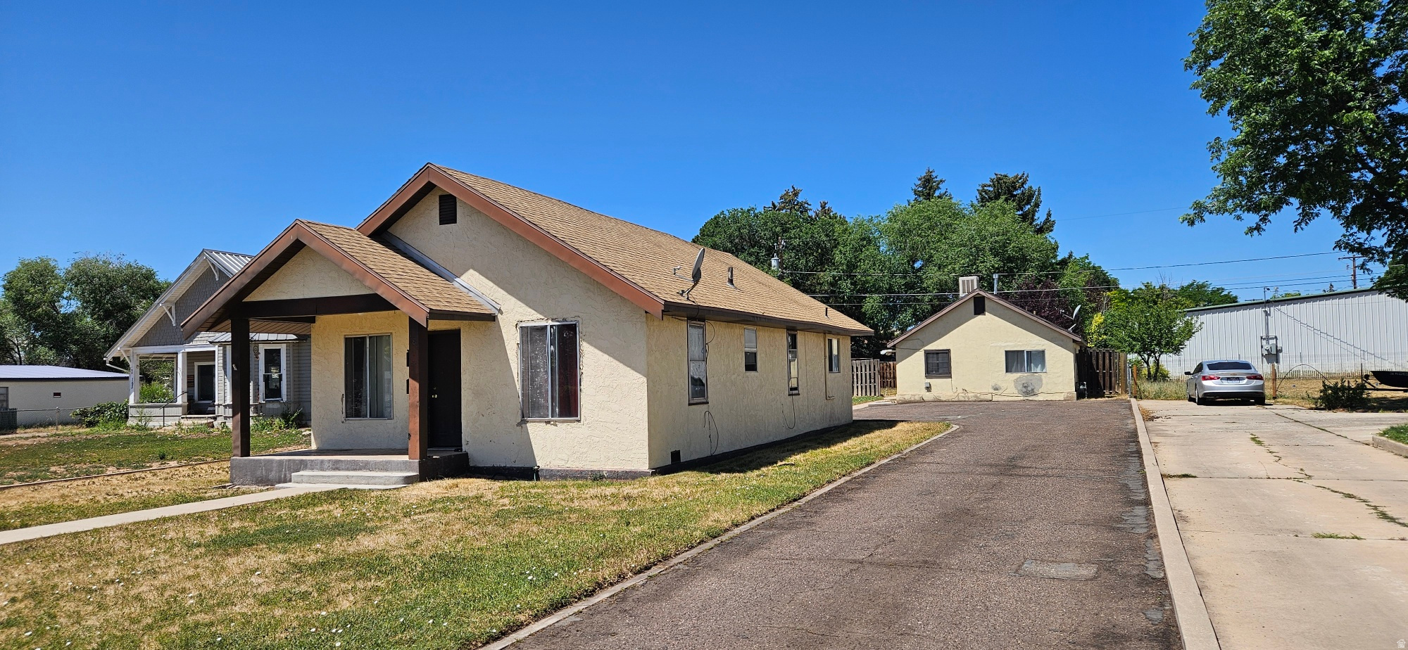 Investment opportunity awaits with this 2 BR, 1 Bath home and a detached 1 BR, 1 Bath ADU. For Sale as is. Measurements are a courtesy of Uintah County Recorder, Buyer to verify all. Please allow a 24 hour notice prior to viewing the ADU... it is currently occupied.