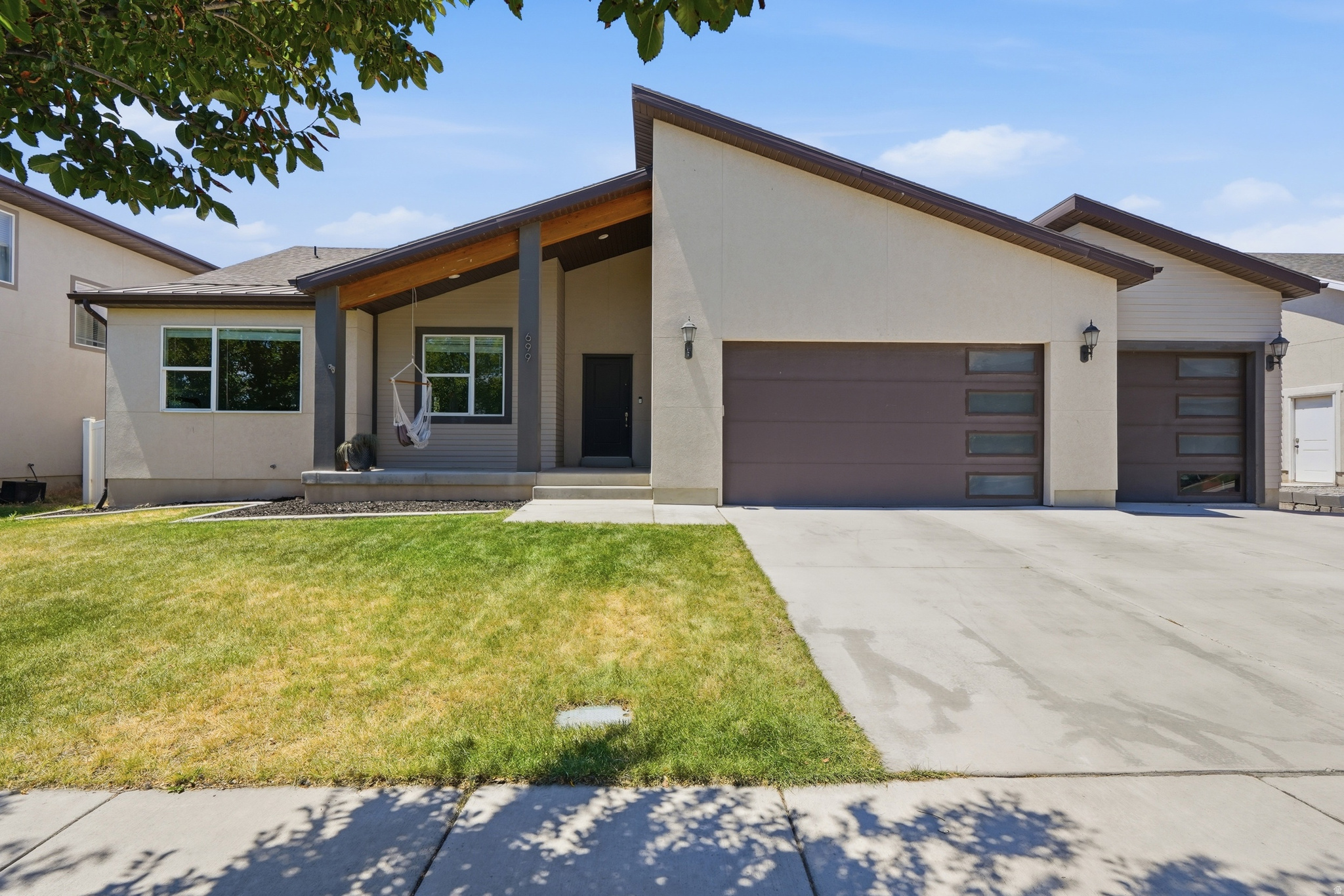 OPEN HOUSE 7/25 FROM 11-1*Be sure to click the tour button for the 3D Tour* Move right into this beautifully maintained 6 bedroom, 3 bathroom home in the highly sought after Legacy Farms community!  Featuring a BRAND NEW finished basement, modern exterior, 3 car garage, a fully fenced back yard, fresh new carpet and a new water heater, this home is ready for its next family. Enjoy an unbeatable location close to schools, the Saratoga Springs temple, parks, plus exceptional HOA amenities including a clubhouse, pool and splash pad. Don't miss this opportunity to own a spacious home in one of the most desirable neighborhoods in the area!