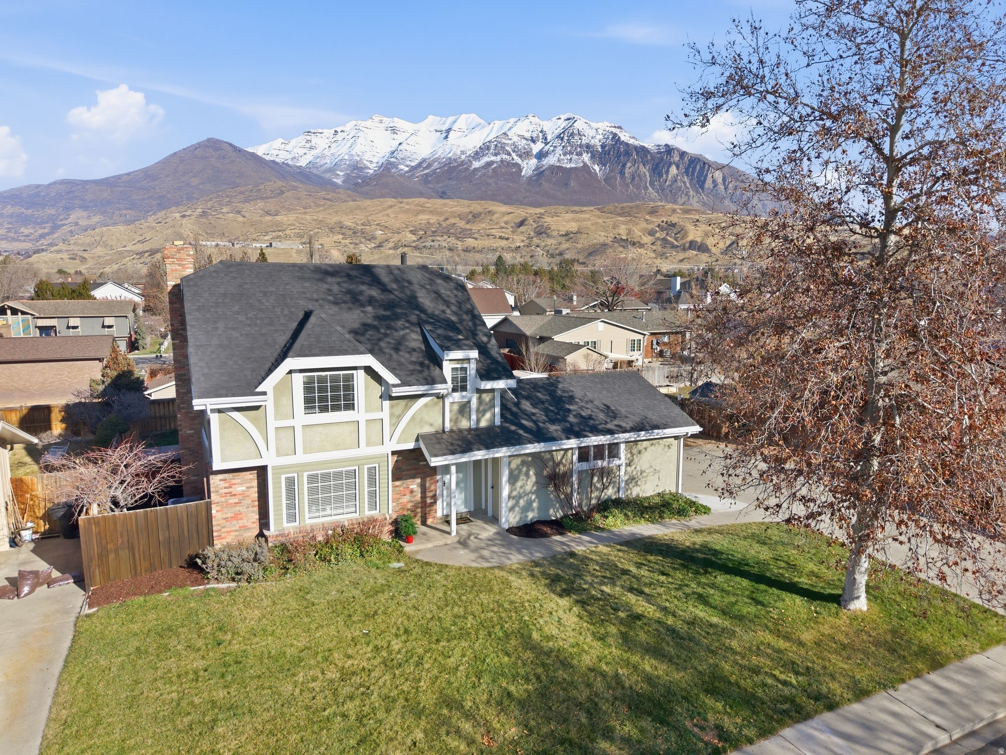 Don't miss this charming home nestled in a quaint and quiet Orem neighborhood that includes a basement mother-in-law suite, complete with its own kitchen. If you're looking for rental income, this house fits the bill! This home is full of character that you just don't see in homes these days, including a 3rd floor loft area that offers a spacious bedroom and bathroom. You'll enjoy spending hours outside in the beautiful, fully-fenced yard, that includes a large Trex patio for outdoor entertaining, as well as a large shed. And those mountain views, they can't be beat! Conveniently located 3 miles from I-15 and just 15 minutes from Sundance, you'll be able to work and play close to home. Also, there is no HOA!