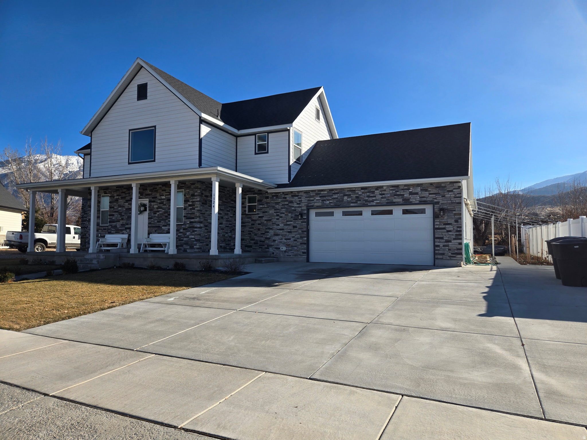 Appraisal came in at $879,900 in late fall. Price has been reduced $94,900, now only $775,000! Gorgeous home and basement apartment that could easily be an ADU, with Payson City approval. This home boasts of a primary suite and laundry on all three levels. Beautiful kitchens on the main level and the basement apartment with quartz counter tops, kitchen islands, and great rooms. Large bedrooms with four bedrooms having walk-in closets. Basement apartment comes with 2 bedrooms, 2 bathrooms, and walk out entrance. You can also access the apartment from inside. Separate alarm systems for the home and the apartment. Also comes with a lot of cold storage under the wrap around porch. Added feature is a gardeners dream in the backyard, and side of house with 21 raised beds. Home also has a wraparound porch, dog run, large 3 car garage that extends into the backyard with garage door. You will also enjoy the neighborhood, and all your great neighbors! Measurements from Utah County records are provided as a courtesy estimate only. Buyer to verify all information.