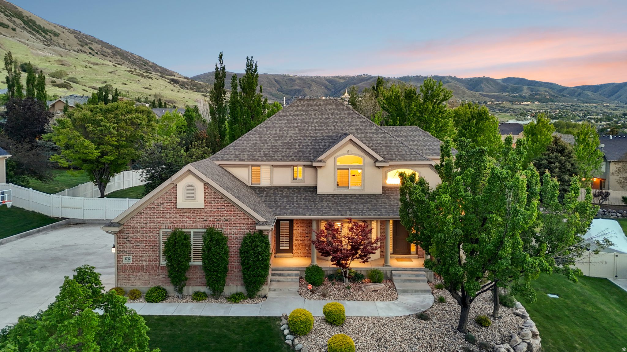 Meticulously cared for and beautifully updated, this stunning Somerset Ridge home offers 4,500 sq ft on a rare flat and private .46-acre lot with breathtaking mountain views. Designed with a timeless open-concept floor plan, the home blends functionality and style with thoughtful upgrades throughout, including a new concrete driveway (2020), whole-home paint, carpet, and LVP flooring (2023), professional lighting package (2023), new furnace (2020), new tankless water heater (2025), custom garage doors (2020), and EV chargers. The expansive backyard offers exceptional privacy, ample space to entertain, and the kind of usable outdoor living space that is becoming harder and harder to find. Located in one of Draper's most sought-after neighborhoods, this home is a rare combination of quality, setting, and livability. Designer furniture package may be included, creating a truly turn-key opportunity.
