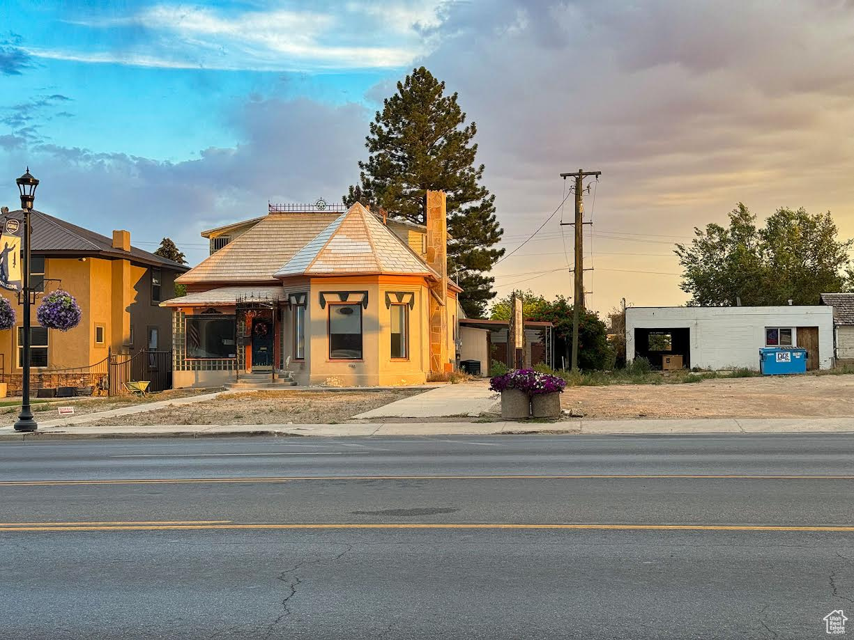 Broker/Owner.  Freedom Realty Corporation has closed the Downtown Vernal Branch Main Street Office.  The building and adjoining property are included. All set up for your office or other purposes!  Remodeled. Connected to public utilities.  Updated electrical with outlets every 3 feet on the main floor for all your devices!  Lots of space for your employees and clients! And room to grow!!  3 large offices downstairs plus a reception area.  Currently minimum 2 offices upstairs plus reception area.  Purchase includes the 1914 building along with the garage, gazebo, and handicap ramp in the back yard. Purchase also includes the lot bordering on the west along with a vandalized building that used to be a garage, but still has potential, with some work. The lot to the west could have many uses including parking, but so much more! You would own from (but not including) American Family Insurance to (but not including)  the Seventh Day Adventist Church.  Vacant and easy to show!  Call us today! Property is winterized.  (Buyer to obtain independent  square footage measurements). New survey!