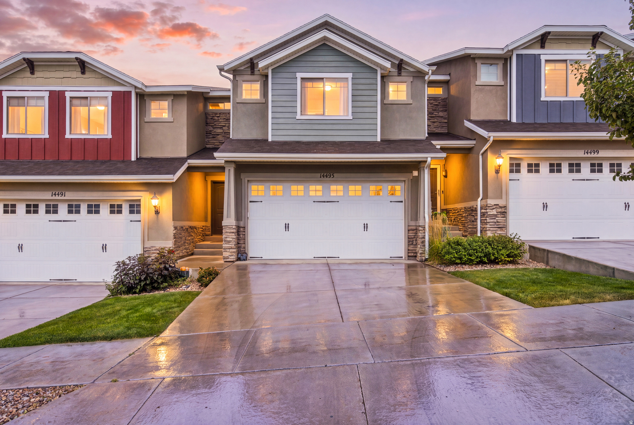 Please join us for an Open House Saturday 7/18 11:00-1:00! Welcome home to this bright, welcoming, and popular floor plan in the coveted Villages at Rosecrest! The main level features durable wood laminate flooring, a powder room, and an impressive kitchen complete with a large breakfast bar, Shaker cabinets, and a frosted-glass walk-in pantry. Just off the main level, step out onto the Trex deck to enjoy beautiful views, or head down to the rare, fully fenced concrete patio below-a perfect enclosed space for pets or play. Upstairs, the massive primary suite boasts two separate walk-in closets and an en-suite bath with an oversized soaking tub. Two additional spacious bedrooms (one with its own walk-in closet), a full guest bath, and a dedicated laundry room complete the second level. The fully finished basement adds a fantastic family room, another full bathroom, and massive storage space. Enjoy a maintenance-free lifestyle with incredible community amenities including a pool, hot tub, fitness center, and playgrounds. Unbeatable location near Blackridge Reservoir, hiking trails, shopping, dining, and the Mountain View Corridor!