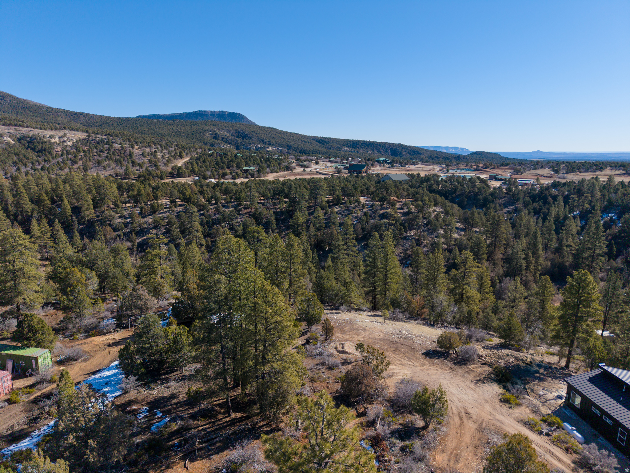Discover your gateway to adventure with this prime, buildable 1.11-acre lot, nestled just outside the east entrance of Zion National Park. Perfectly positioned for convenience and serenity, it's only 10 minutes from the new Zion Visitors Center currently under construction and a quick 20-minute drive to the East Entrance, offering easy access to the park's iconic red rock landscapes, hiking trails, and natural wonders.   This ready-to-build parcel comes fully equipped with essential utilities: a brand-new septic system, power stubbed up on the property, and connection to the subdivision's new water system ($50k value), saving you time and hassle as you plan your dream getaway. Whether you're envisioning a cozy vacation cabin for personal retreats or a lucrative short-term rental investment, the possibilities are endless in this high-demand area.   Elevate your lifestyle with breathtaking panoramic views overlooking Zion National Park and Zion Ponderosa Ranch Resort, where sunrises and sunsets paint the sky against a backdrop of majestic pines and rolling terrain. Don't miss this rare opportunity to own a slice of paradise in one of Utah's most sought-after regions-contact us today to make it yours! Buyer to verify all.