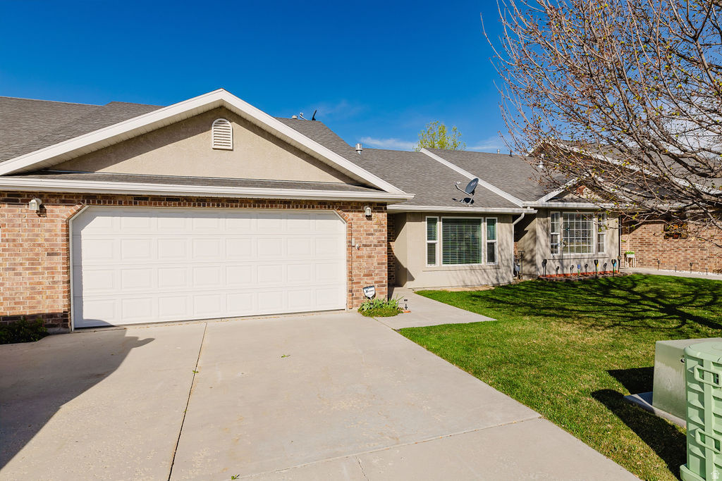 Clean and well maintained single level condo located in peaceful 55+ community in Smithfield! The interior has been updated with beautiful flooring and quartz countertops. Backyard is very large and relaxing for these types of communities. Don't worry about mowing or shoveling though as the HOA is responsible for those lame chores. The 2 car garage has a lot of space too! Great opportunity for those looking for a single level home in 55+ community! Square footage figures are provided as a courtesy estimate only and were obtained from county records. Buyer is advised to obtain an independent measurement. Buyer and buyer agent to verify all info.