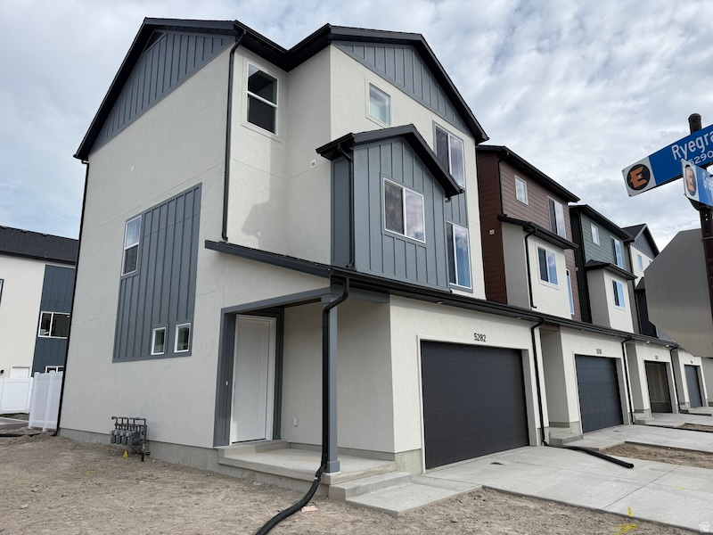 New Price Incentive. End-unit - Elevated design. Close before end of April to receive additional builder incentives-timing matters. 3-story townhome built for real life. 3 bedrooms, 2.5 baths, deep 3-car garage with extended storage for bikes, gear, seasonal overflow. Smart separation of space across levels creates privacy where needed, openness where it counts. Main level: light- filled, open flow. 9' ceilings, 8' doors, oversized windows amplify volume. Clean, modern finish throughout-waterproof LVP flooring, matte black hardware, contemporary trim. Kitchen dialed in for function and durability. Quartz counters. 42" custom cabinetry with soft-close dovetail drawers, pull-out shelving, dedicated garbage cabinet, cookie-sheet storage. 16-gauge single- bowl stainless sink, Moen Sleek faucet, GX Pro disposal with air-switch. LG microwave and range. Upstairs: all 3 bedrooms. Primary suite with dual closets, private bath. Bathrooms finished with quartz, adult-height vanities, framed mirrors, premium Moen fixtures. Primary bath includes double vanity, water closet, semi-Euro glass shower with built-in shelving and footrest. Efficiency + tech built in: 95% Lennox furnace, 14-SEER A/C, Honeywell T9 Wi-Fi thermostat, EV charging rough-in, Kwikset Z- Wave lock, LiftMaster MyQ garage system, Cat-6 wiring, charging outlets (including pantry). Amsco Studio windows. Stucco exterior with James Hardie accents. End unit. More light. More privacy. More value. Square footage figures are provided as a courtesy estimate only and were obtained from builder plans. Buyer is advised to obtain an independent measurement.