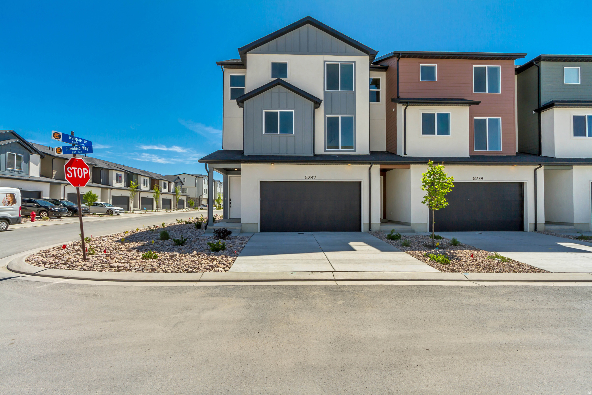 New Price Incentive. End-unit - Elevated design. Close before end of April to receive additional builder incentives-timing matters. 3-story townhome built for real life. 3 bedrooms, 2.5 baths, deep 3-car garage with extended storage for bikes, gear, seasonal overflow. Smart separation of space across levels creates privacy where needed, openness where it counts. Main level: light- filled, open flow. 9' ceilings, 8' doors, oversized windows amplify volume. Clean, modern finish throughout-waterproof LVP flooring, matte black hardware, contemporary trim. Kitchen dialed in for function and durability. Quartz counters. 42" custom cabinetry with soft-close dovetail drawers, pull-out shelving, dedicated garbage cabinet, cookie-sheet storage. 16-gauge single- bowl stainless sink, Moen Sleek faucet, GX Pro disposal with air-switch. LG microwave and range. Upstairs: all 3 bedrooms. Primary suite with dual closets, private bath. Bathrooms finished with quartz, adult-height vanities, framed mirrors, premium Moen fixtures. Primary bath includes double vanity, water closet, semi-Euro glass shower with built-in shelving and footrest. Efficiency + tech built in: 95% Lennox furnace, 14-SEER A/C, Honeywell T9 Wi-Fi thermostat, EV charging rough-in, Kwikset Z- Wave lock, LiftMaster MyQ garage system, Cat-6 wiring, charging outlets (including pantry). Amsco Studio windows. Stucco exterior with James Hardie accents. End unit. More light. More privacy. More value. Square footage figures are provided as a courtesy estimate only and were obtained from builder plans. Buyer is advised to obtain an independent measurement.
