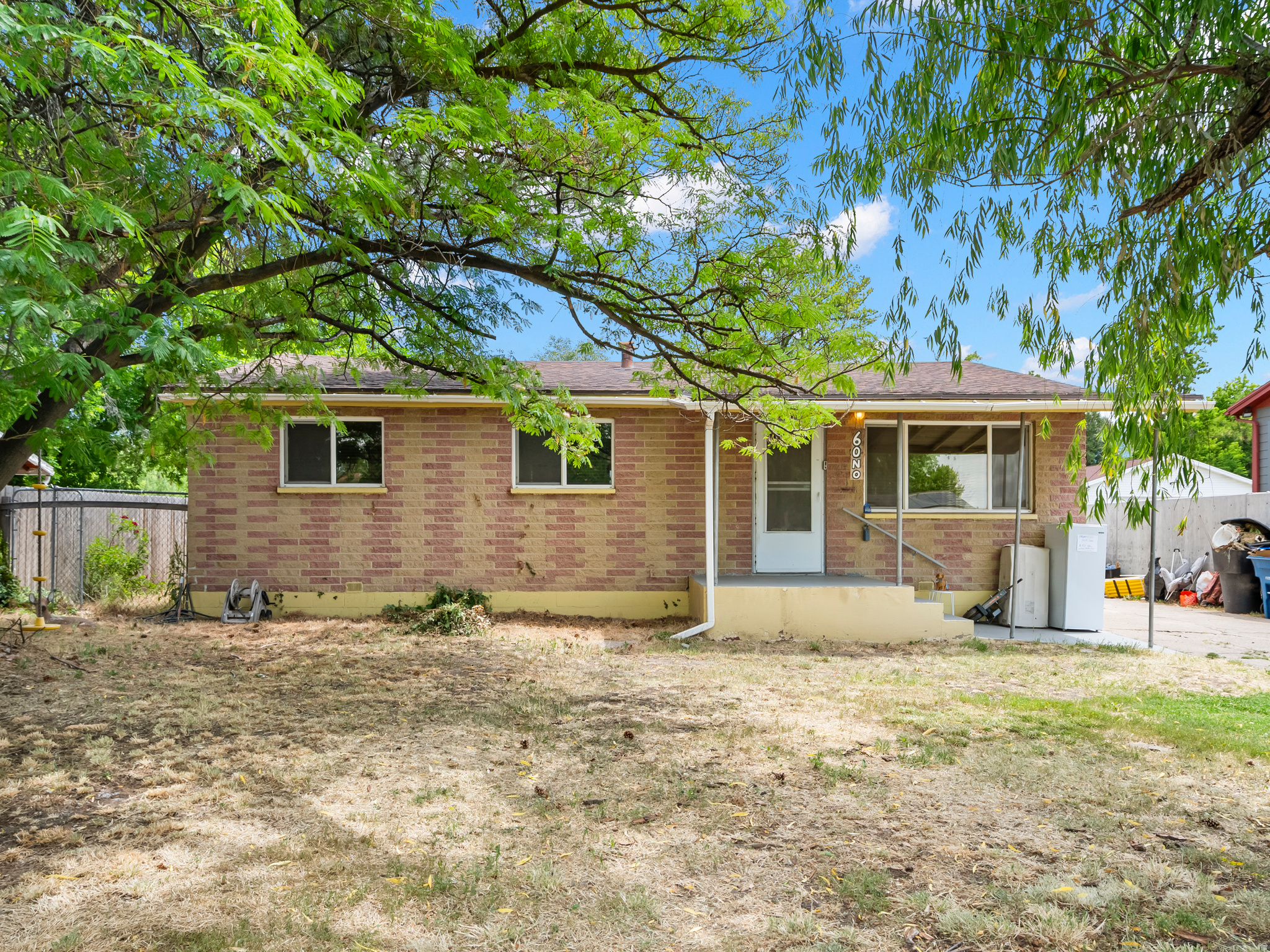 Huge .38 lot downtown Kaysville! Charming home with tons of potential. Single level living, all brick bungalow. Just minutes from the freeway and all of what Kaysville has to offer. Square footage figures are provided as a courtesy estimate only and were obtained from county records.  Buyer is advised to obtain an independent measurement.