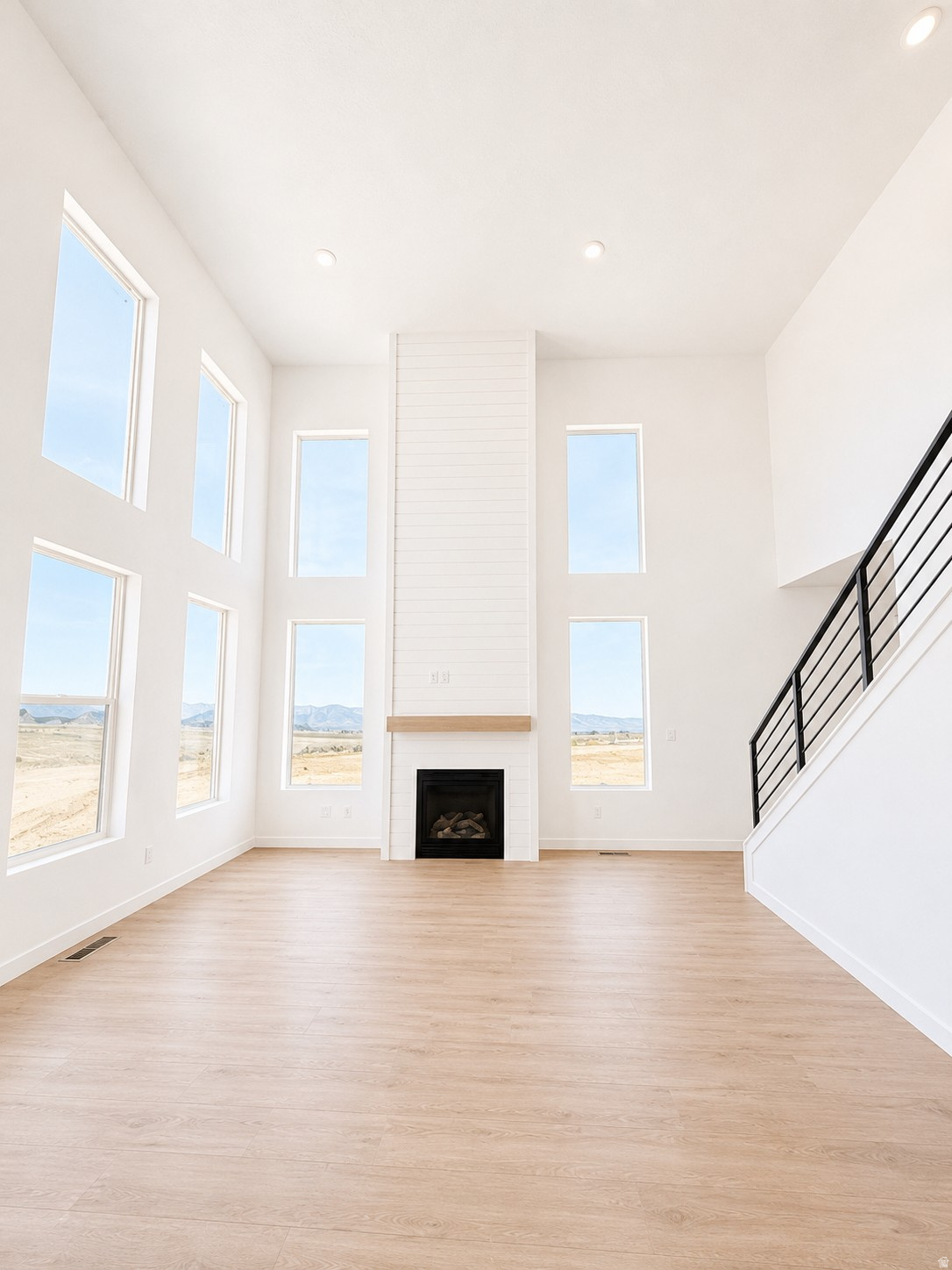 **2.99% builder paid rate incentive available, don't miss this incredible opportunity to own a brand-new home with an exceptionally low monthly payment! Be sure to ask for details. This beautiful home offers 4 bedrooms, 2.5 bathrooms, a dedicated office, a 3-car garage, and an impressive great room with soaring 20-foot ceilings that create a bright, open living space. The luxurious primary suite features a designer ensuite with built-in shelving, while one of the secondary bedrooms includes a spacious walk-in closet. The unfinished walkout basement provides endless possibilities to expand and customize your living space. Situated on a private, flat, and fully usable 0.32-acre lot with no backyard neighbors and stunning mountain views, you'll enjoy both privacy and beautiful scenery. Built with quality craftsmanship and designer finishes throughout, this home also includes a 2-year builder warranty and a 10-year structural warranty for added peace of mind. Call Angelina today at 360-513-2795 to schedule your private tour before this incredible home is gone!