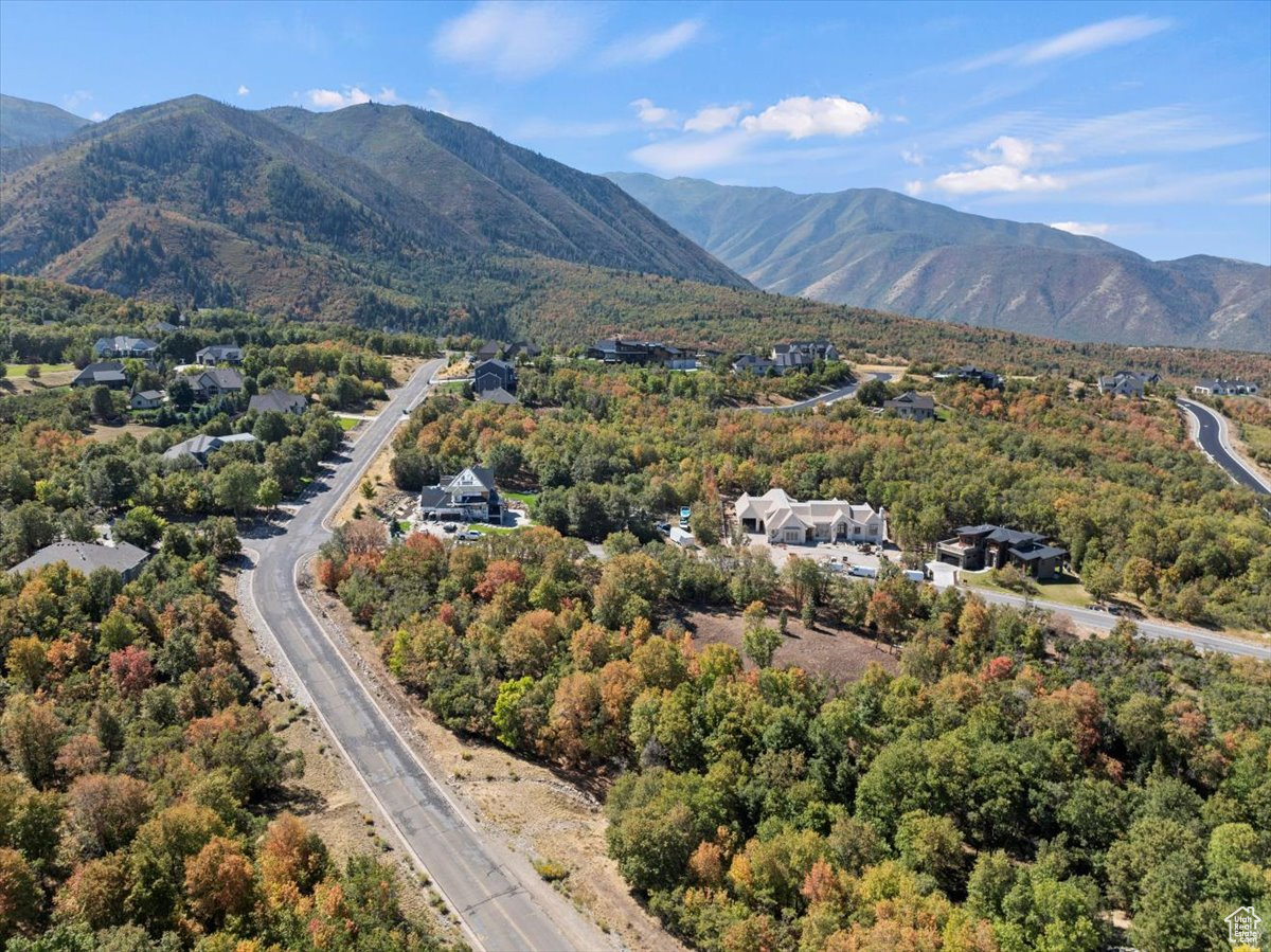 Build your dream home on this stunning 1.07 acre lot in the gorgeous community of Woodland Hills! Nestled in the foothills with sweeping mountain and valley views, this property offers the perfect blend of privacy and natural beauty. Enjoy the serenity of a wooded setting while being just minutes from shopping, dining, and I-15 access. With community trails, open space, and luxury custom homes nearby, this is an ideal location to create a one-of-a-kind retreat. Geological survey has been completed. Don't miss this opportunity to own a piece of Woodland Hills!
