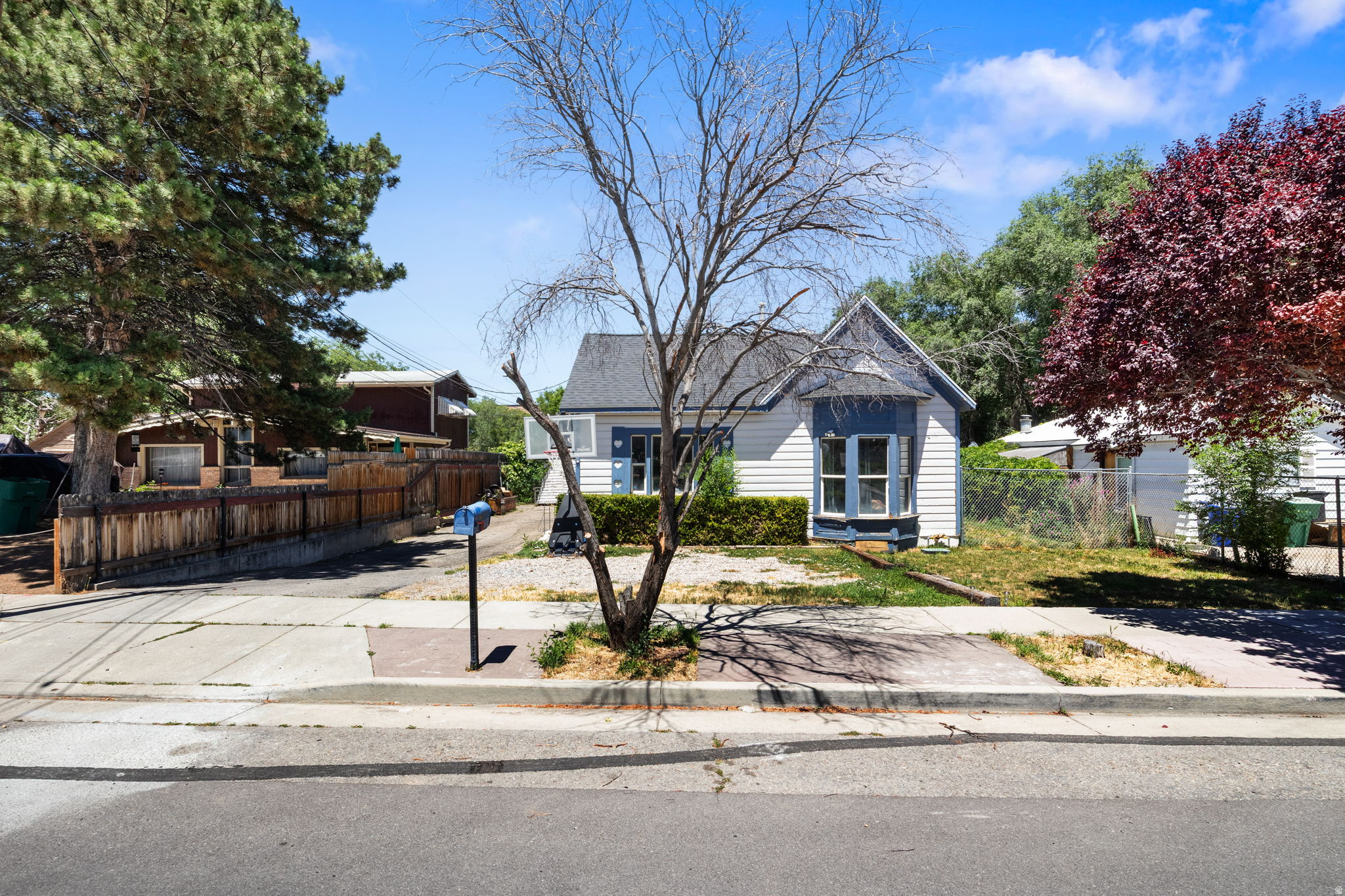 Check out this adorable 3 bedroom home in the heart of West Jordan.   This home has an updated kitchen, new roof, newer water heater and new paint inside.  There is a mud room shared with the laundry and extra storage.   The back yard is fully fenced.   Single car garage used to park in or used for storage.  It even has it's own chicken coop,   Automatic Sprinklers for the yard.   This home has 1 full bath and 1 half bath.  Easy access to Redwood Rd, tons of shopping and restaurants.  Square footage figures are provided as a courtesy estimate only and were obtained from the county records. Buyers are advised to obtain an independent measurement.  PROPERTY IS SOLD AS IS!