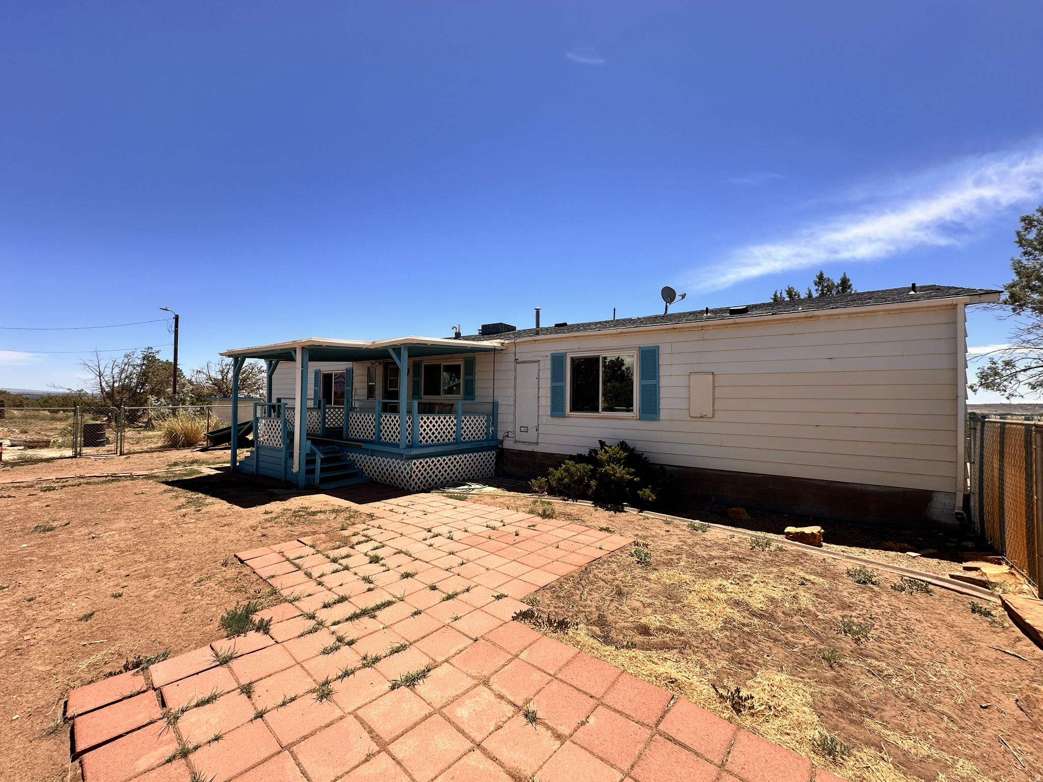 Single-level living with breathtaking views and room to grow! This unique property includes 5.00 total acres featuring a well-maintained 3-bedroom, 2-bathroom home with central A/C, a heat pump, private well, and septic system. Located just 1015 minutes from town, you'll enjoy the peace and privacy of country living while remaining close to everyday amenities. The sale includes an additional 2.50-acre parcel (Parcel #00-0006-0834), see MLS #2167079 or can be purchased separately, creating a total of 5.00 acres. Each parcel may be built on separately, offering outstanding flexibility for a second home, guest house, investment opportunity, or future development (subject to applicable approvals). The property also includes Water Right #43-8926, and a well in place adding significant value and versatility. This is an exceptional opportunity to own acreage with incredible views, development potential, and the convenience of nearby town. Schedule your private showing today! Square footage figures are provided as a courtesy estimate only and were obtained from county records. Buyer is advised to obtain an independent measurement and verify all information, including building potential, water rights, and permitted uses.