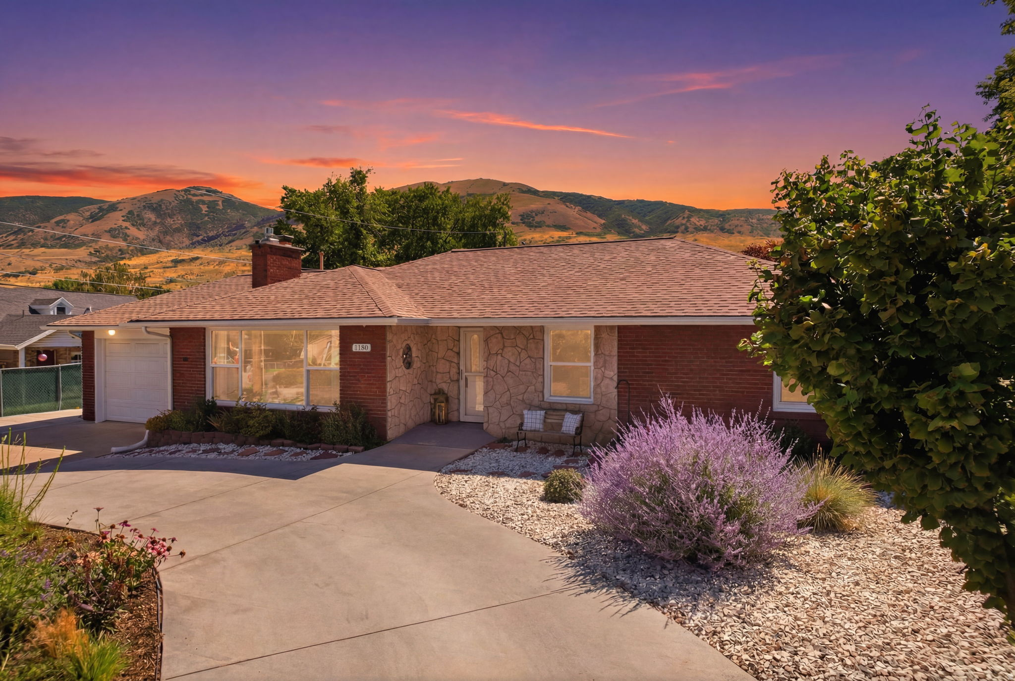 RARE ADU OPPORTUNITY + INCREDIBLE GARAGE SPACE + OVER $200,000 IN THOUGHTFUL UPGRADES! Welcome to a truly exceptional Bountiful property where every improvement has been thoughtfully-designed to enhance the way you live. One of the home's most valuable features is its ADU approval. Thanks to Bountiful's updated regulations, homeowners have the rare opportunity to live in the ADU while renting the primary residence, creating outstanding income potential or a seamless multigenerational living solution. Inside, you'll immediately appreciate the quality and attention to detail. The beautifully remodeled chef's kitchen-completed with an investment of approximately $90,000-features soft-close cabinetry, pull-out storage, premium finishes, a smart gas range with built-in air fryer, and a custom oversized Grade 5 sliding glass door that fills the home with natural light and creates effortless indoor-outdoor living. Both bathrooms have been tastefully renovated, the interior has been professionally painted, and thoughtful upgrades such as a remote-controlled gas fireplace, custom closet systems, updated electrical, sound-insulated office, and custom window treatments add comfort and sophistication throughout. Step outside to discover a backyard designed to be enjoyed in every season. Nearly 5,000 square feet of additional concrete creates generous spaces for entertaining, dining, and relaxing. Mature apple, almond, and hazelnut trees surround raised garden beds, while the fully equipped greenhouse offers electricity, lighting, ventilation, storage, and secondary irrigation water. Hammock stands, recreation areas, rain barrels, and beautifully established landscaping complete a setting that feels like your own private retreat. As the perfect finishing touch, enjoy the unique sight of hang gliders soaring overhead against the Wasatch Mountains. For those needing exceptional storage or workspace, this property is difficult to match. In addition to the attached two-car garage, you'll find an insulated detached four-car garage complete with its own furnace, dedicated workshop, upgraded insulated garage doors, 220V power, EV charging capability, and a quiet garage door opener installed in 2025-making it ideal for collectors, hobbyists, home businesses, or outdoor enthusiasts. The extensive list of infrastructure improvements provides peace of mind for years to come, including a newer air conditioning system with surge protection, whole-home surge protector, owned Culligan water softener, reverse osmosis system serving both the kitchen and refrigerator, a new water heater with thermal expansion tank (2025), double-pane windows, insulated crawl space with moisture barrier, vinyl privacy fencing, new gutters, soffit and fascia (2023), and a dedicated outlet already installed for a future hot tub. Opportunities like this are exceptionally rare...a home that seamlessly combines investment potential, extensive high-end improvements, extraordinary garage and workshop space, and an outdoor setting designed for gathering, gardening, and making lasting memories.  All information deemed to be accurate and reliable. Buyer(s) to verify all.