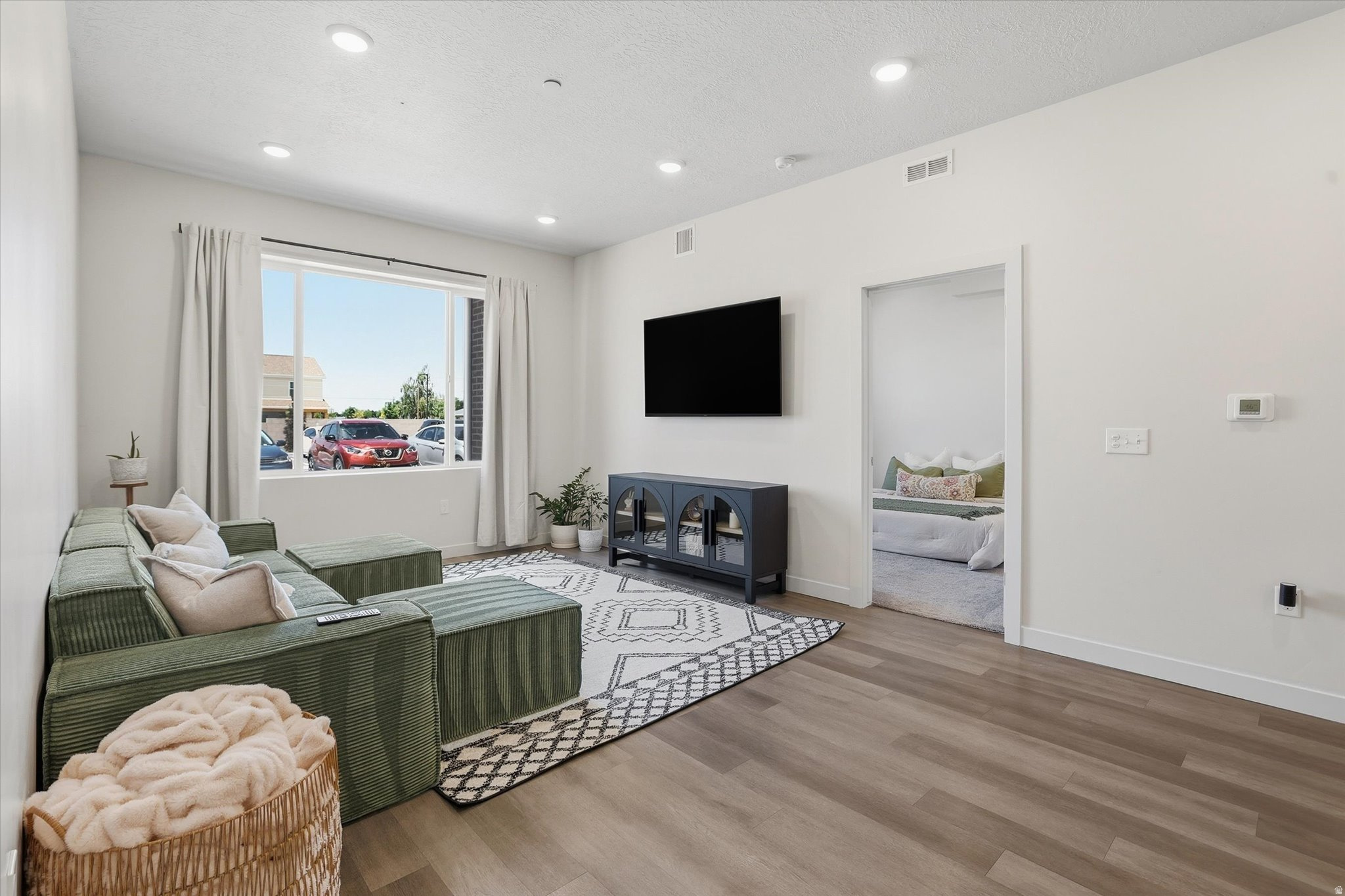 Experience easy modern living at The Morrelli at Meadowbrook. Nestled in a quieter corner of the community, this desirable main-level condo offers added privacy, fewer shared walls, abundance of natural light, and the convenience of effortless access.   Inside, you'll find a bright open layout with contemporary finishes, spacious living spaces, and a clean modern aesthetic designed for comfortable everyday living. The low-maintenance lifestyle is complemented by HOA-covered water, sewer, trash, and basic internet service.   Located just minutes from shopping, dining, mountain recreation, downtown Ogden, Weber State University, and convenient freeway access, this home offers both connection and convenience in all directions.   Flexible ownership opportunities available, including seller financing and lease-to-own options with approved terms. A rare opportunity for buyers seeking affordability, flexibility, and modern comfort in a growing Ogden community.   Square footage figures are provided as a courtesy estimate only and were obtained from county records. Buyer is advised to obtain an independent measurement.