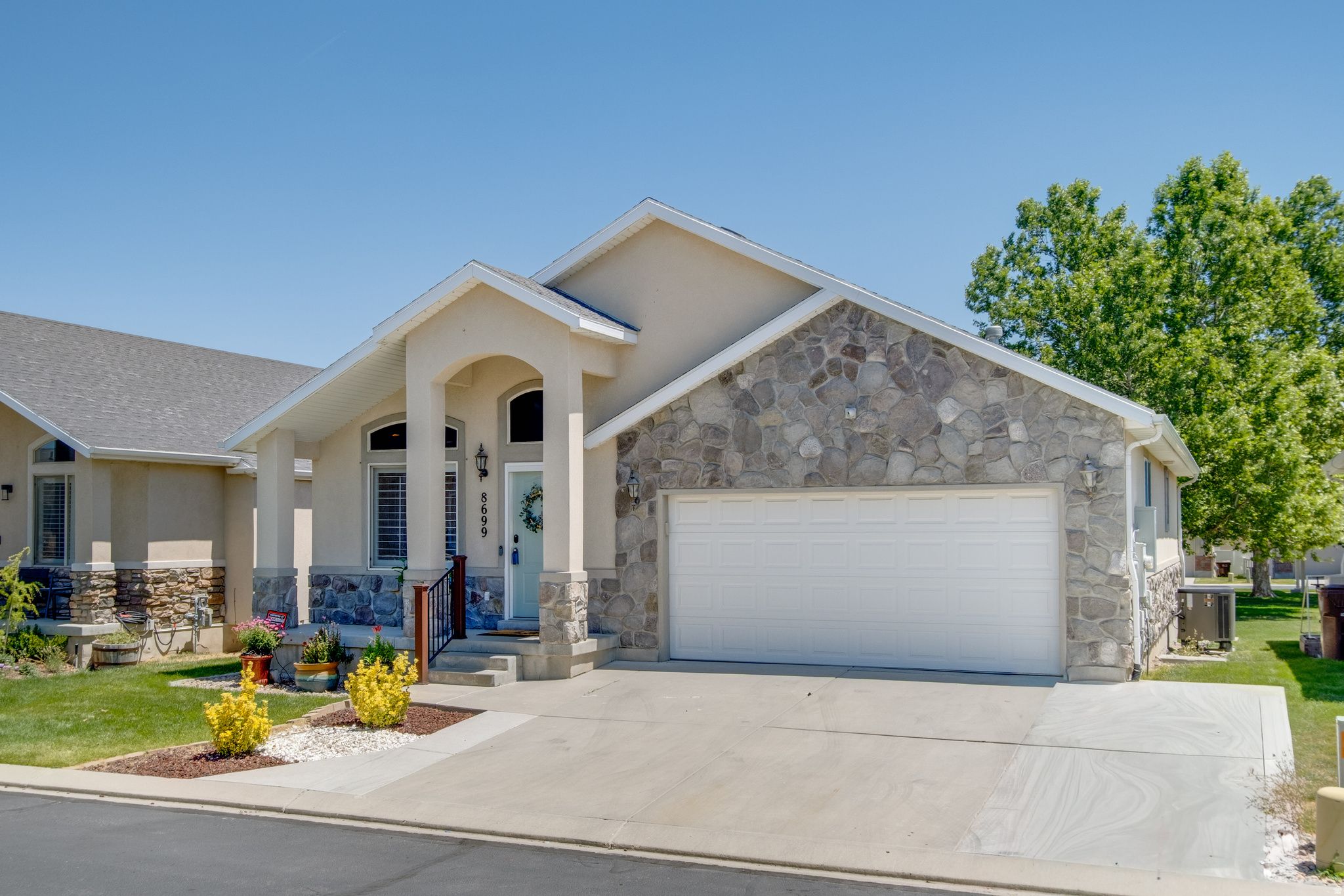 Enjoy the Convenience of Main-Level Living in this Beautifully Updated Home in the Gated Dove Meadows Community. Designed for Comfort and Easy Everyday Living, the Home Features a Remodeled Kitchen with Double Ovens, Abundant Storage, and Generous Gathering Space that Flows Seamlessly into the Main Living Areas. The Spacious Primary Suite Offers a Large Walk-In Closet and Updated Bathroom, while Plantation Shutters add Warmth and Character Throughout. Step Outside to a Private Trex Deck Overlooking Open Space, Complete with a Built-In Hot Tub for Year-Round Enjoyment. The Finished Basement Provides Additional Space for Entertaining with a Large Family Room and Wet Bar. Additional Highlights Include Premium HVAC, Air Purification and Humidification Systems, Programable Jellyfish Lighting, Smart Home Features, and EV Charging. Move-In Ready and Meticulously Maintained. Don't Let this Home Pass You By!