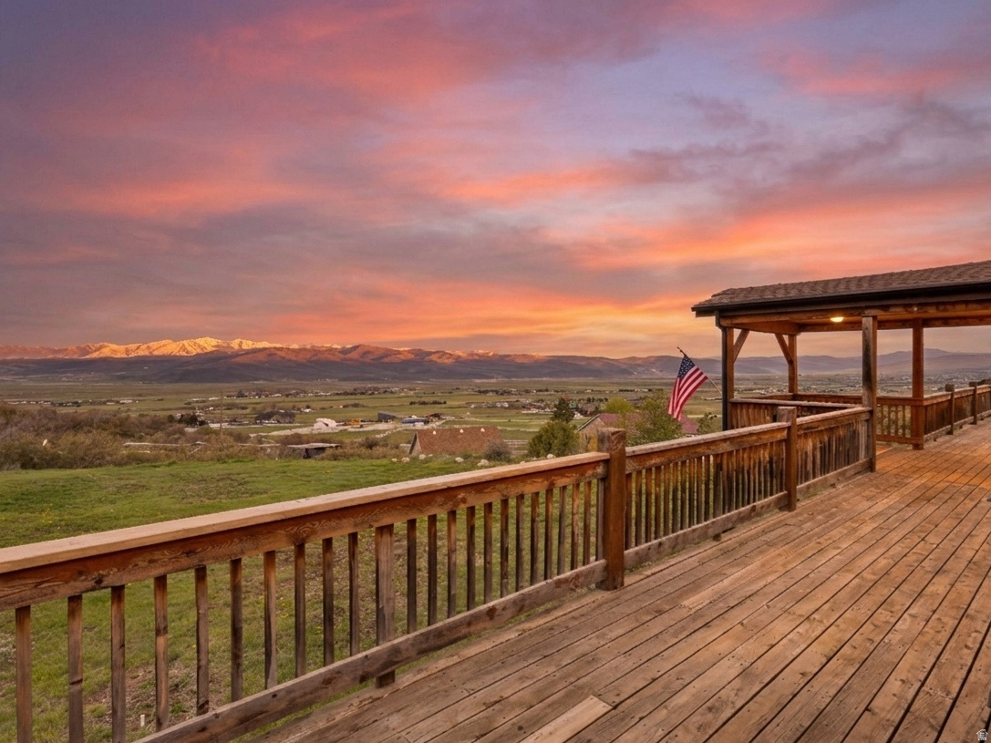 Escape to 1.48 acres of pristine mountain solitude at 290 Splendor Valley Road. Bordering the Uinta-Wasatch-Cache National Forest, this property serves as a private gateway to Utah's most iconic wilderness. Your backyard isn't just a lot; it's an expansive landscape of AG-2 zoned terrain that transitions seamlessly into thousands of acres of protected forest, offering immediate access to hiking, horseback riding, and world-class recreation. The land is designed for those who value independence and the outdoor lifestyle. With nearly an acre and a half of usable space, there is ample room for outbuildings, gear storage, or animal rights, all while maintaining a sense of profound privacy. Imagine crisp mornings watching local wildlife and evenings under the vast, unobstructed stars of the Kamas Valley. The residence is positioned to maximize these views, featuring a substantial footprint that includes a 1,908-square-foot lower level-perfect for a custom gear room, a home gym, or a workshop tailored to your mountain pursuits. Equipped with a private 220-foot well and septic system, this estate offers a self-contained retreat without sacrificing proximity to the amenities of Park City and the Heber Valley. This is more than a home; it is a basecamp for a life lived outdoors. Whether you're trail-running into the forest from your back door or simply enjoying the quiet of a Summit County sunset, this property offers the space and freedom to define your own mountain legacy. The home is listed under appraised value!!!! Square footage figures are provided as a courtesy estimate only. Buyer is advised to obtain an independent measurement.