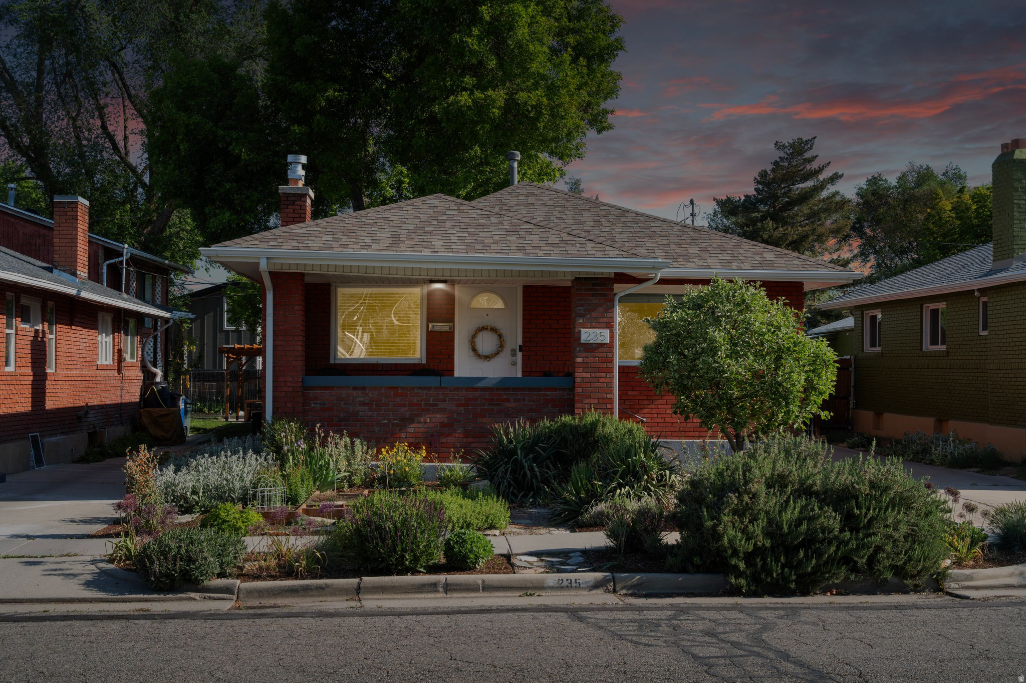 Great brick bungalow with real character in one of Salt Lake City's most accessible neighborhoods. Original hardwood floors, high ceilings, and oversized double-pane windows give the main level a light-filled, open feel. The kitchen has been updated with granite counters and stainless steel appliances - all included. Xeriscaped front yard keeps maintenance low; the fully fenced backyard with expanded patio is ready for summer. The finished basement adds flexible space for a guest room, office, or den. Oversized detached garage with extra height, extra width, workshop, and workbench - a rare find. New HVAC installed in May 2026. New water heater in 2025. Electrical updated in 2021. Fiber optic internet. Clean, well-maintained, and move-in ready.  Square footage figures are provided as a courtesy estimate only and were obtained from tax records. Buyer is advised to obtain an independent measurement.