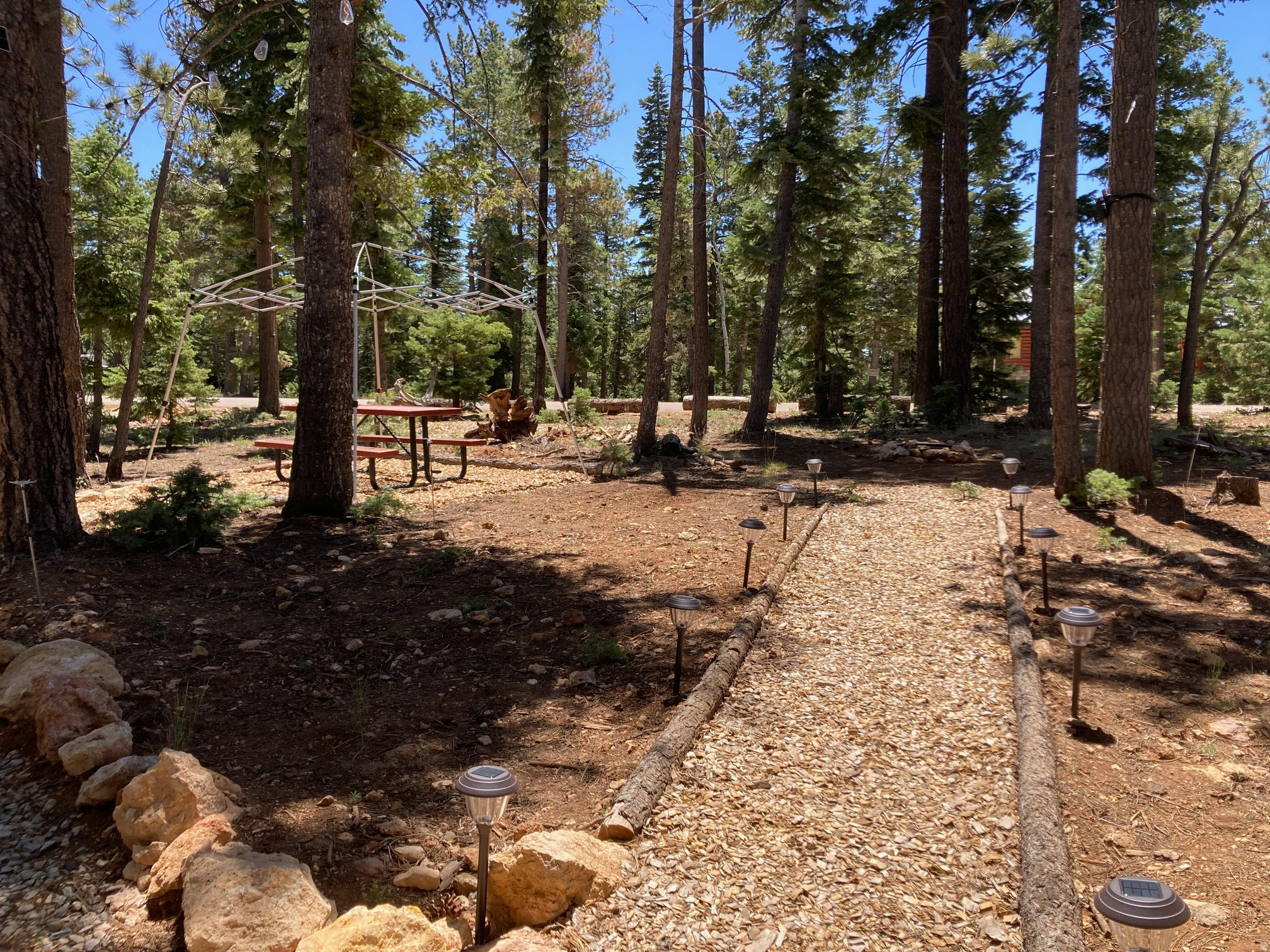 PRICE REDUCED HOA does allow cabin owners to rent their cabins making it a great income generating opportunity. Beautiful 1/2 Acre Cabin Lot with Utilities Installed and Gravel Driveway near Duck Creek Village, Utah. Build your dream mountain getaway or start enjoying it immediately! This beautiful lot in the highly desirable Duck Creek Ridge Color Country Subdivision is just 5 minutes from Duck Creek Village and comes fully equipped with power, water, and septic already installed - saving you time and thousands in development costs. The property is ready for your custom cabin with utilities and infrastructure already in place. Situated on level ground with an abundance of mature pine trees, the property offers privacy, easy access, and a peaceful mountain setting. A well-built gravel drive-through driveway lined with rocks allows for smooth entry and exit - perfect for future cabin access. Located near Duck Creek Village, you're just a few minutes from groceries, gas stations, restaurants, shops, and small-town conveniences - while still surrounded by nature. Within a 60-mile radius you can enjoy Bryce Canyon National Park, Cedar Breaks National Monument, Zions National Park, and a host of lakes and mountain trails. Outdoor recreation is endless with ATV/UTV trail systems, horseback riding, fishing, hiking, kayaking, snowmobiling, skiing, cave exploring, and abundant wildlife viewing all within minutes of the property. Roads are maintained and cleared in winter, providing year-round access. This parcel represents a rare opportunity to acquire improved land in the highly desirable Duck Creek area - one of Southern Utah's most consistent recreation markets. You would have a hard time finding another property like this, and you will not be disappointed if you're looking for a great place to get away from it all. Buyer to verify all information.