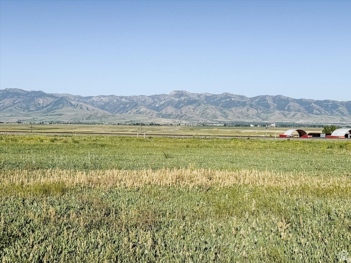Embrace the wide open spaces on this peaceful 4.8 acre parcel.  Ideal for building your dream home or starting your own little hobby farm.  Power is stubbed to the lot.  1 well right is included PLUS 1 water share with West Cache Irrigation Co.  Address is approximate.  If you put 7182 N 4800 W Smithfield in Google Maps, it will get you to the property which is directly south of 7182 North.  Seller plans to do a 1031 Exchange.