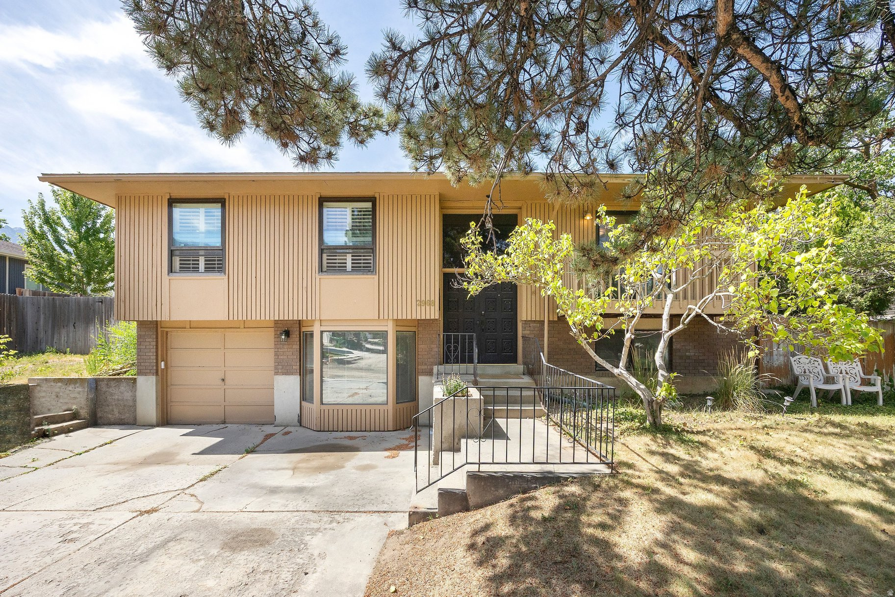 Opportunity awaits in one of Cottonwood Heights' most desirable neighborhoods! This Cardiff Way property offers the perfect combination of existing improvements and untapped potential, making it an exceptional opportunity for investors, renovators, or buyers looking to create their dream home.  Set on a beautiful lot with a spacious, private backyard, the property provides an ideal setting for entertaining, gardening, or simply enjoying Utah's four seasons. Inside, several thoughtful renovations have already been completed, offering a strong foundation while leaving plenty of room to add your own style and value. Whether you're envisioning a modern luxury renovation, a timeless traditional design, or a high-end investment project, this home serves as a blank canvas ready to bring your vision to life.  Located just minutes from world-class skiing, hiking and biking trails, parks, shopping, dining, and easy freeway access, this is a rare chance to invest in a highly sought-after Cottonwood Heights location with strong long-term upside. Whether you're looking to renovate and occupy, flip, or build long-term equity, the possibilities here are endless.