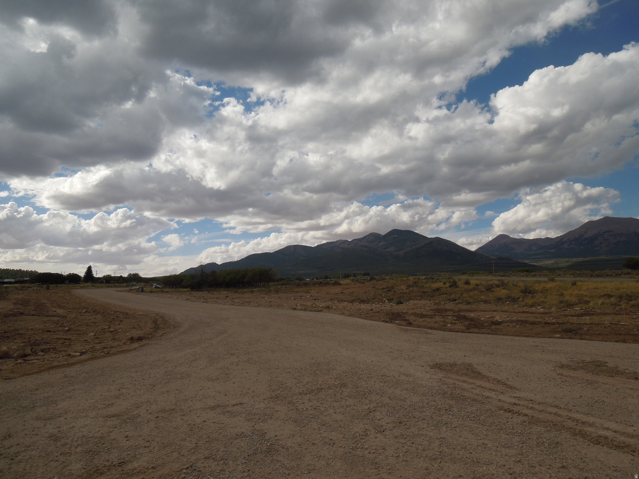 Lovely views of LaSal Mt. peaks and to the East San Juan Mts. in Colorado, and Pine Ridge to the South. Great recreational access for biking, hunting and 4 wheeling. You'll need to drill a well and install a septic system. Underground power transformer pedestal at frontage.  Seller financing terms require 15 % down payment, with balance carried at 6 % interest for a period of up to 15 years. Sellers will impose a prepayment penalty of 10 % to be in effect for a term of 5 years for any amount paid over the amortized monthly payment.  Sellers are related to Listing agent.