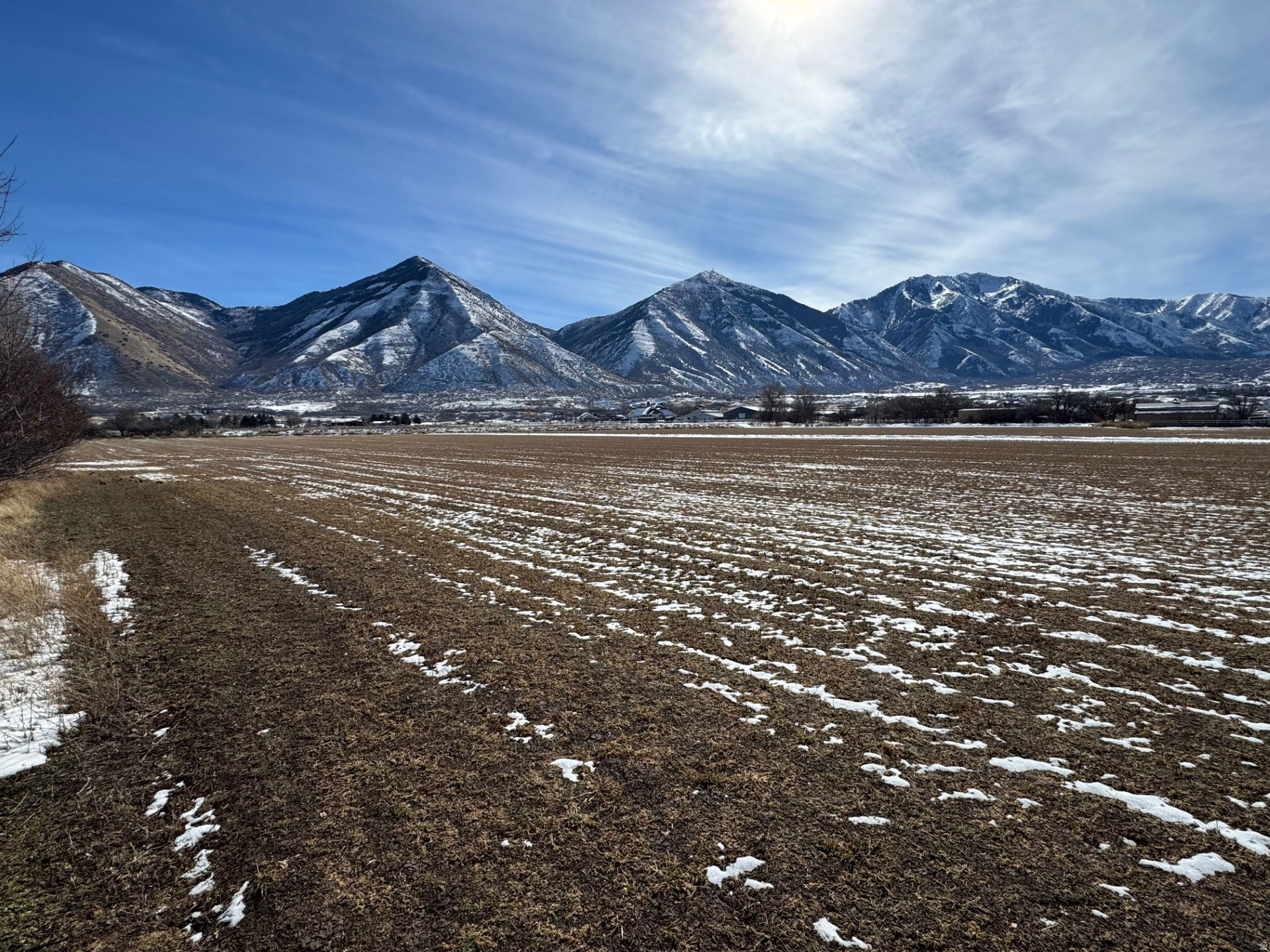 This is 4 parcels totaling 14.212 acres of flat farm land. Located on the SE corner of 180 North and Woodland Hills Dr. Property currently sits in Utah County but is directly adjacent to Salem City and could be annexed. Great development possibilities. Great water rights/shares included with the sale. Beautiful property with great potential. Includes tax parcel numbers: 29-051-0116, 30-039-0148, 30-004-0082, and 29-050-0130.