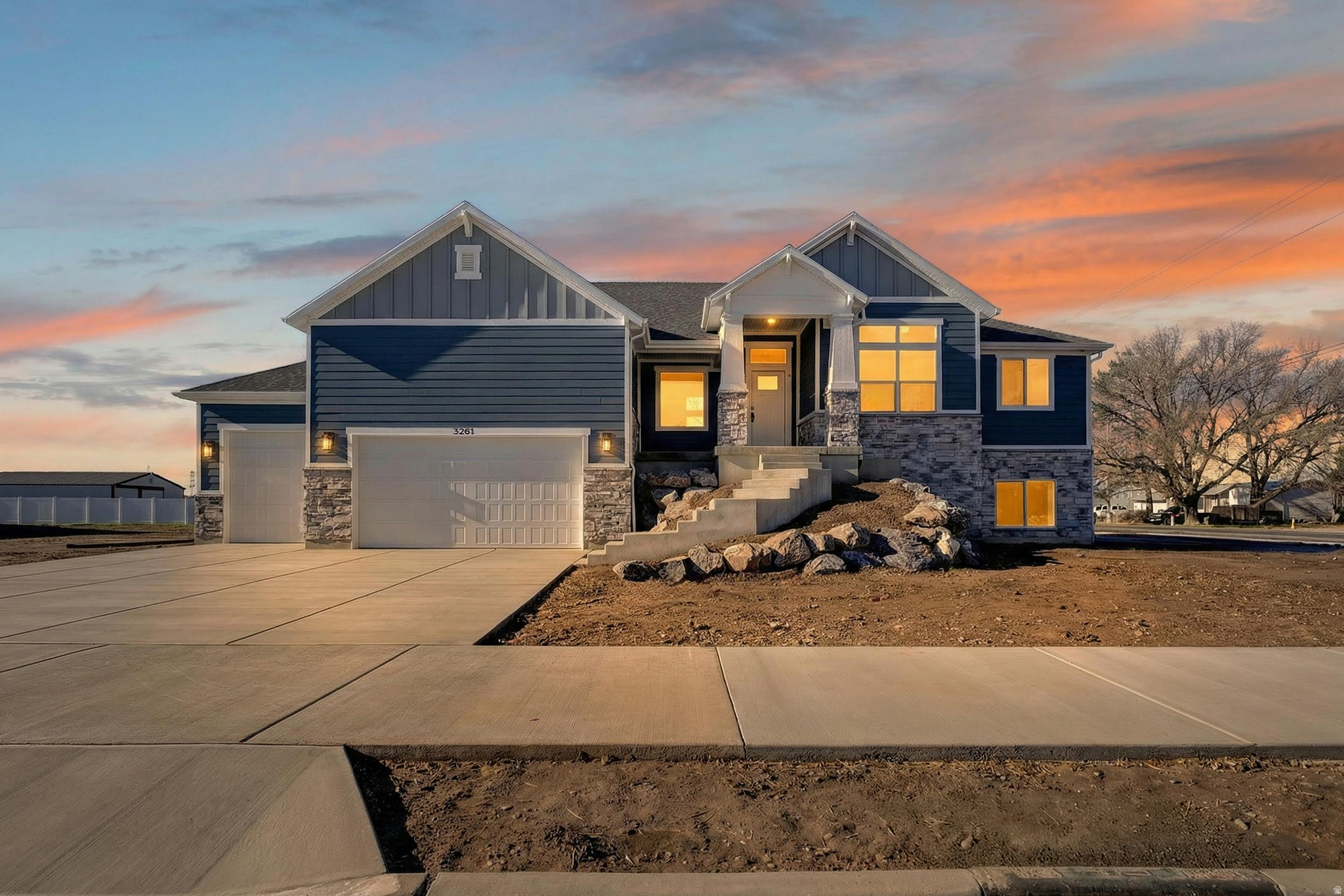Step into this beautifully crafted rambler that truly checks every box. The charming craftsman exterior sets the tone, and inside you'll find a bright, open layout filled with natural light and elegant finishes. The main level features two spacious bedroom that includes a relaxing primary suite, along with a large laundry room that adds everyday convenience. The kitchen is a showstopper for anyone who loves to cook or entertain, with double wall ovens, stylish cabinetry, and an oversized pantry that offers incredible storage and functionality. Downstairs, the fully finished basement adds 3 more generously sized bedrooms, tons of storage space, a walkout, and is plumbed for a future kitchen. This is perfect for hobbies, a home theater, or whatever fits your lifestyle. Car lovers and outdoor enthusiasts will appreciate the oversized 4-car garage, offering plenty of space for vehicles, tools, and toys. Sitting on a large lot with beautiful views, this property gives you room to spread out while enjoying a peaceful setting. Front yard landscaping and fencing is included in the purchase price. We're also offering some incredible incentives on this home with our preferred lenders* Be sure to ask for details.