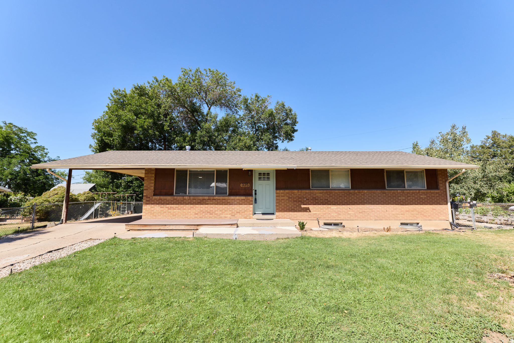 Beautifully updated east bench Kaysville home! This spacious home offers exceptional value in one of Kaysville's most desirable east bench neighborhoods. Featuring numerous updates throughout, you'll appreciate the newer kitchen cabinets, new range, updated windows, newer flooring, central A/C, and the rare convenience of an upstairs primary complete with its own private bathroom. Major mechanical updates have already been taken care of with a brand new furnace, air conditioner, and water heater, all installed last year, providing peace of mind for years to come. The finished basement adds even more versatility with a kitchenette and a bonus room, making it ideal for entertaining, extended family, a home office, gym, playroom, hobby space, or additional storage.  Situated on a desirable corner lot, the property offers mature trees, RV parking, and plenty of outdoor space to relax, entertain, or play. Offering generous living space, modern updates, and an unbeatable location close to schools, parks, and everyday amenities, this home is an incredible opportunity to own in one of Kaysville's most sought after neighborhoods.