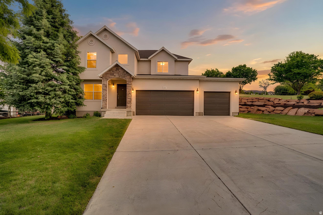 This home is ready for immediate move-in and competitively priced to sell quickly! Set on a generous corner lot of over half an acre, this 4-bedroom home offers spacious living inside and out, along with an unfinished basement ready for your personal touch and future expansion. Recently updated with fresh exterior paint and all-new lighting, the interior showcases a neutral color palette and brand-new carpet throughout, creating a clean, move-in-ready feel. The open floor plan is ideal for everyday living and entertaining, and the oversized bedrooms provide plenty of comfort and flexibility. With two laundry areas for added convenience and a large yard offering room to expand the home, add concrete for RV parking, or create additional parking, this property is full of potential.