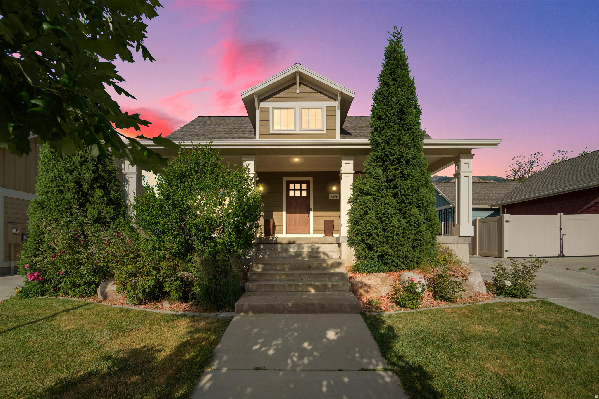 Enjoy relaxing evenings on the front porch or entertaining in the backyard of this charming 3-bedroom, 2-bath home with a detached 2-car garage in The Oak Den Bungalows, nestled in the heart of Ogden's Historic District. Thoughtfully designed to complement the surrounding neighborhood, this home blends timeless character with modern features, including granite countertops, tile, and laminate wood flooring, an on-demand water heater, and energy-efficient construction. The fully landscaped and fenced backyard offers a private setting for outdoor enjoyment, with a gated driveway. A detached garage and a large basement/crawl space (with stairs for easy access) provide ample storage for tools, gear, and seasonal items. Enjoy convenient access to downtown Ogden's restaurants, shopping, and entertainment, including the historic Peery's Egyptian Theater and Ogden Raptors games. Outdoor recreation is just minutes away, with Pineview Reservoir and three world-class ski resorts, including Snowbasin Resort, a venue for the 2034 Winter Olympics. Don't miss this opportunity to own a well-maintained home in a prime location. Schedule your private showing today. Square footage provided as a courtesy. Buyer is encouraged to obtain an independent measurement.