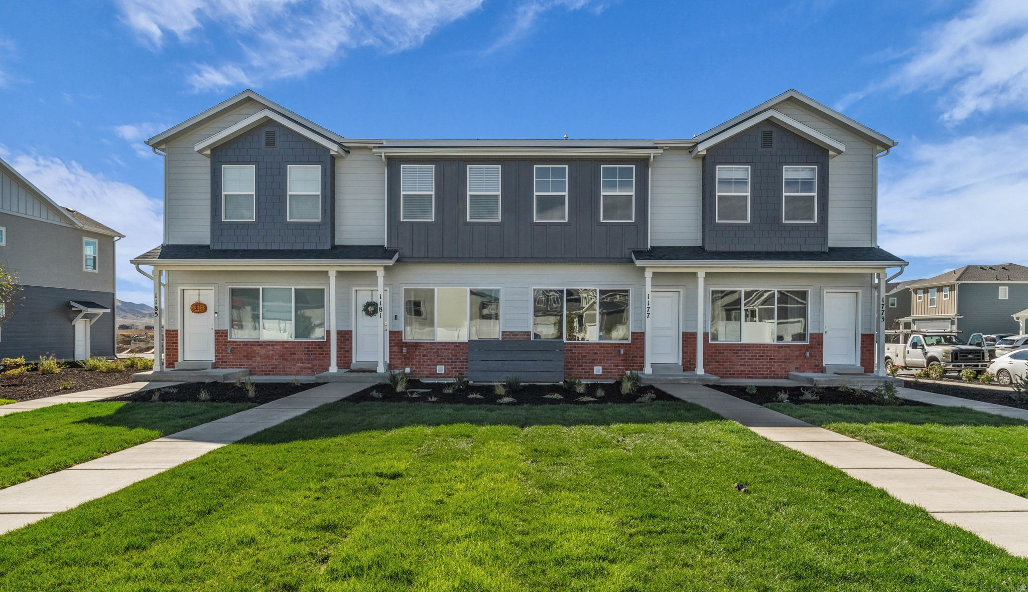 INTEREST RATES STARTING AS LOW AS 4.99% with our preferred lender or AMAZING $5,000 INCENTIVE TOWARDS CLOSING COSTS, RATE BUYDOWN, OR PRICE REDUCTION REGARDLESS OF LENDER! (Talk to agent for conditions). Plus, this home qualifies for Utah's First-Time Homebuyer Program-giving you up to AN ADDITIONAL $20,000 for down payment, closing costs, or interest rate buydown! Must-see Harmony Community in Eagle Mountain! This beautiful interior unit townhome built by Flagship Homes has great natural light and 9' ceilings on top 2 floors. This townhome features 3 bedrooms, 3 bathrooms, a finished basement, quartz slab countertops, painted cabinets, laminate flooring on the main level, 1 car garage with a service door, an extended driveway for extra parking and full landscaping. The primary bedroom has a large walk-in closet with dual sinks in the primary bathroom. It also has a full-size laundry room. This townhome is move-in ready. Call for more information or stop by our model home at 1456 E. Starling Lane, Eagle Mountain for a tour. Model home hours: Monday-Saturday 11 AM - 6 PM. Buyers to verify all information. Square footage is from house plans. PHOTOS are from a staged model and furniture NOT included with purchase.
