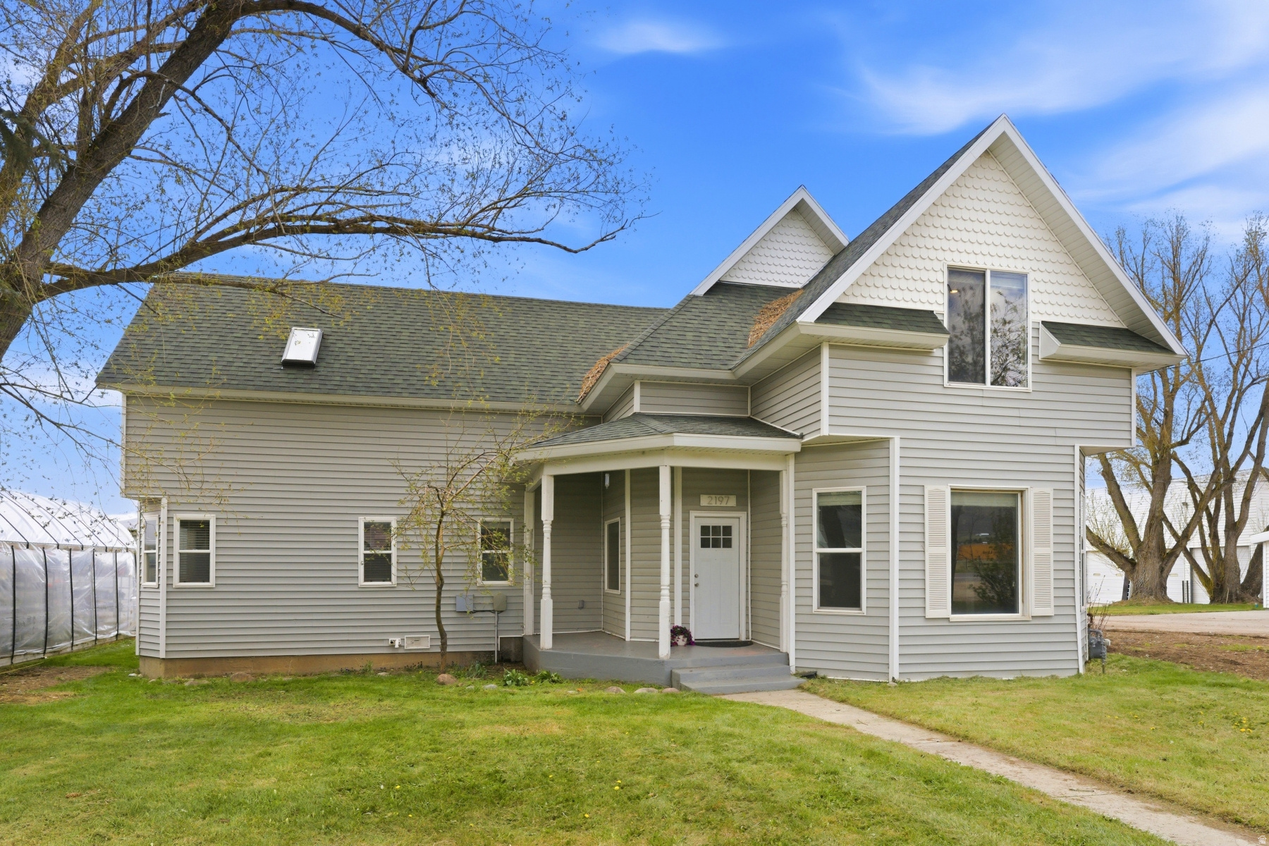 Some homes hold history in their walls. This Victorian farmhouse in Marion, Utah is one of them. Originally built in 1895 and thoughtfully rebuilt on its original footprint in 2019, the home honors its heritage with soaring Victorian ceilings, generously proportioned rooms, and original historic elements - while offering the complete comfort and confidence of modern construction throughout. The heart of the home is a large, beautifully appointed kitchen designed for gathering - equally at home for a quiet morning or a table full of people. A main level primary suite with ensuite provides single-level convenience, while upstairs two bedrooms and a flexible lounge space - already plumbed for a kitchenette or wet bar - offer privacy and versatility for guests, family, or creative use. Step outside and you are surrounded by the working agricultural landscape of the Kamas Valley - open fields and mountain views on three sides that no future development will ever disturb. It is the kind of setting that feels increasingly rare and increasingly valuable. Two minutes down the road, High Star Ranch is becoming one of Utah's most compelling year-round destinations - with 16 miles of world class trails, equestrian facilities, exceptional events, and the soon-to-be-opened Beaumont Bakery at the Country Store. A 150-room hotel and expanded resort amenities are underway the future plans evolve, bringing new energy to a valley that has always deserved it. Park City is 18 miles away. Salt Lake International Airport is 45 minutes. The mountains, trails, and rivers of the Uinta and Wasatch are right outside your door. This is Summit County living at its most authentic - heritage, landscape, and location, before the rest of the world catches up.  3D Matterport Tour: https://my.matterport.com/show/?m=KhFwatXXNru