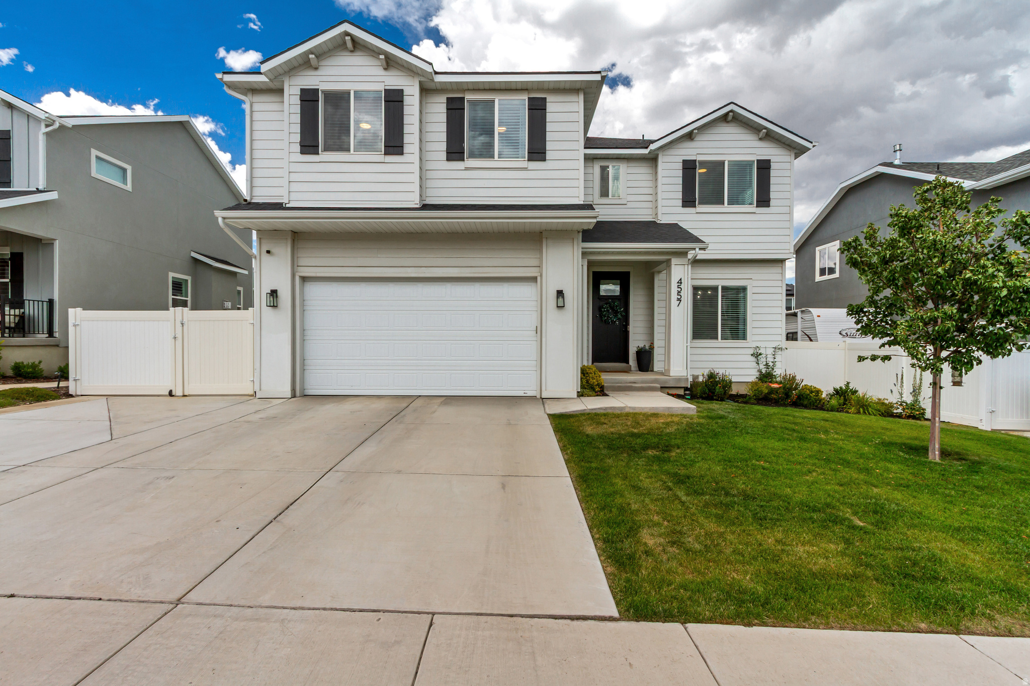Practically brand-new and meticulously maintained, this beautiful 4-bedroom home offers the perfect combination of modern living, space, and convenience in a quiet, family-friendly neighborhood. The thoughtfully designed floor plan features four spacious bedrooms plus a versatile loft upstairs, ideal for a second living area, home office, or playroom. The oversized primary suite provides a relaxing retreat with plenty of room to unwind. Step outside to a fully fenced, professionally finished backyard that's perfect for entertaining, kids, or pets. An RV pad provides space for your trailer, boat, or recreational vehicles, while the garage is already equipped for Tesla/EV charging. Enjoy the benefits of a low HOA that includes access to a community pool, clubhouse, fitness center, and scenic walking and biking trails. Located just minutes from top-rated schools, shopping, dining, and everyday conveniences, this home offers an unbeatable lifestyle.Need more space? The unfinished basement provides endless potential to customize and add equity with additional bedrooms, a family room, home gym, theater, or storage. This move-in-ready home truly has it all-modern finishes, exceptional outdoor space, room to grow, and an outstanding location. Don't miss your opportunity to make it yours!