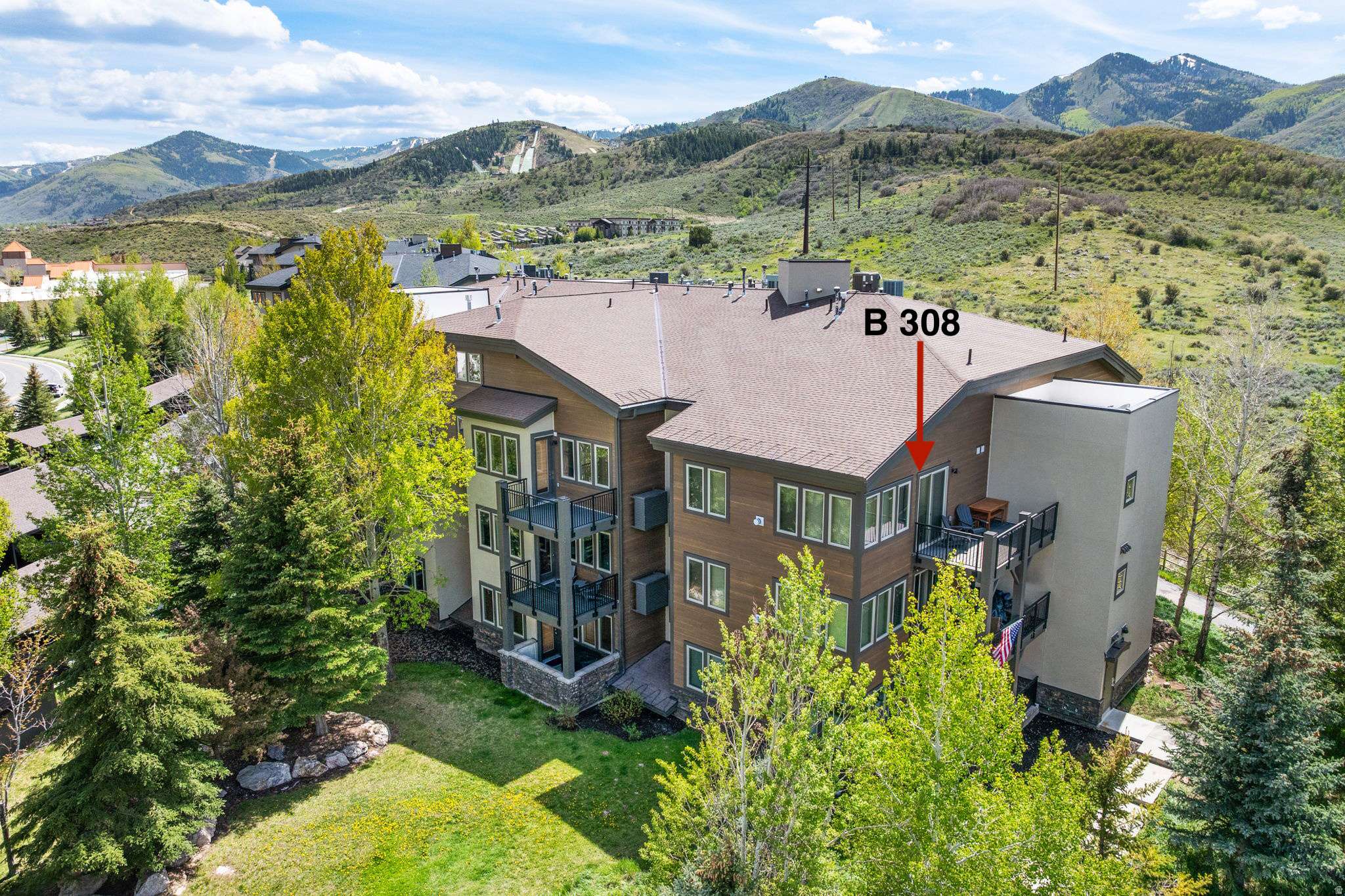 Top-floor end-unit with two bedrooms, a spacious loft, and three full bathrooms, featuring large windows and mountain views. Located just minutes from world-class ski resorts and steps from hiking and biking trails, this home is ideal for enjoying the Park City lifestyle year-round. An open floor plan and soaring vaulted ceilings throughout the main level create a bright, spacious feel. Family room with a gas fireplace and dining area opens to a private deck overlooking the peaceful mountain setting. Fully equipped kitchen features a gas stove, granite countertops, solid oak cabinetry and stainless appliances. Main-level primary suite offers a walk-in closet and ensuite bathroom with a double-sink vanity. Second bedroom is also on the main level adjacent to a full bathroom. Upstairs, loft provides additional sleeping space, office area, walk-in closet, and  ensuite bathroom. Multiple owner closets and abundant storage throughout. Offered fully furnished, this spacious condo works well as a primary residence, vacation property, or investment opportunity. Central air conditioning and washer and dryer for added comfort and convenience. One of the best locations in Crestview--just steps from clubhouse, pool, hot tub, gym, and walking trail. Included are a designated parking space in the heated, secure garage and one of the largest private storage closets in the building, measuring 13 x 6, ideal for bikes, skis, and outdoor gear. Building also includes an elevator and additional covered outdoor parking. Community recently completed extensive exterior renovations, including new windows, roofs, and decks. Conveniently located in Kimball Junction near restaurants, shopping, and on the free Park City bus route, Salt Lake City International Airport is approximately 35 minutes away.