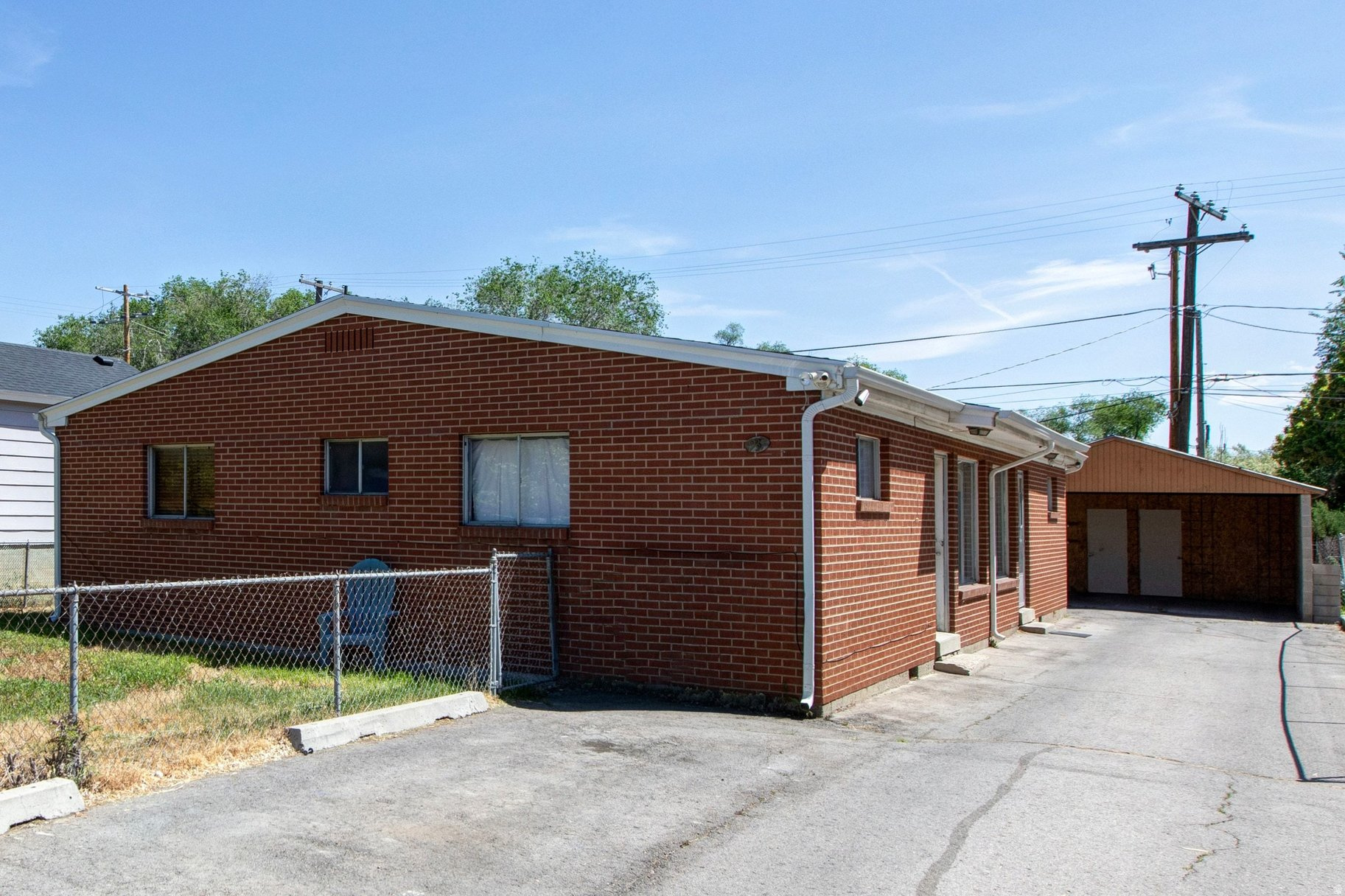 Exceptional investment opportunity with significant upside potential! This well-maintained duplex features long-term tenants in place, offering immediate cash flow with room to increase rents to market rate. Both units boast washer/dryer hookups and covered parking, keeping tenants happy and turnover low. The fully fenced property provides privacy and security, while the prime location offers quick freeway access, a major draw for renters. Don't miss this rare chance to acquire a turnkey asset with built-in value-add potential.