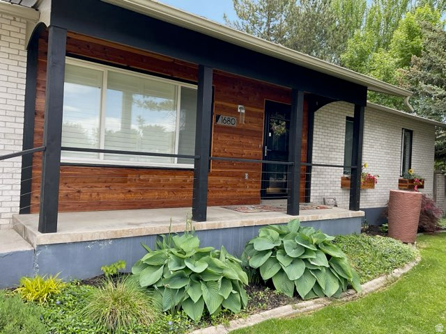 Price Improvement!! Welcome home to this beautiful, updated home in the popular Lundstrom Park area. Updates include: all flooring on main level, kitchen, primary bath, front porch posts and railings, redwood accents on front facade, and a wonderful, adjustable pergola on the back deck (choose full sun, full shade or in between) Cozy up in front of the gas fireplace and have the peace of mind of a wood burning stove in the basement. Shelves in mech room, washer/dryer included. Waiting for you to call it home!