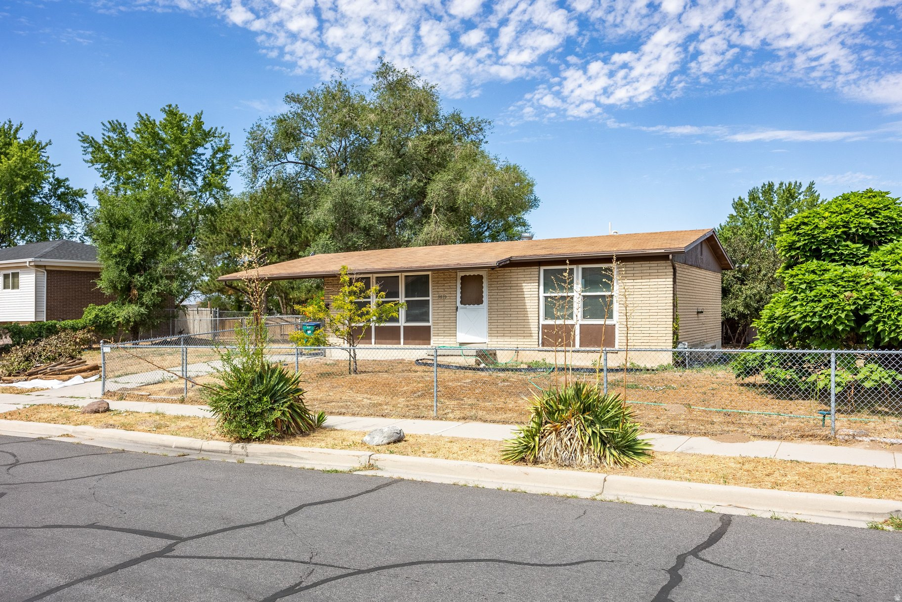 Rare opportunity to own a property in prime Sandy. Situated on a desirable corner lot, this one story home offers a functional layout with the potential to convert an additional downstairs room into a 4th bedroom, ideal for a renovation or investment project. The landscaping offers great potential of its own, and the location can't be beat, just 5 minutes to I-15 with easy access to mountain recreation, shopping, and restaurants nearby. The property requires significant updating, making it a great opportunity for a flip or long term rental. An investor or contractor looking to add value won't want to miss this one. All information herein is deemed reliable but is not guaranteed. Buyer is responsible to verify all listing information, including square feet/acreage, to buyer's own satisfaction.
