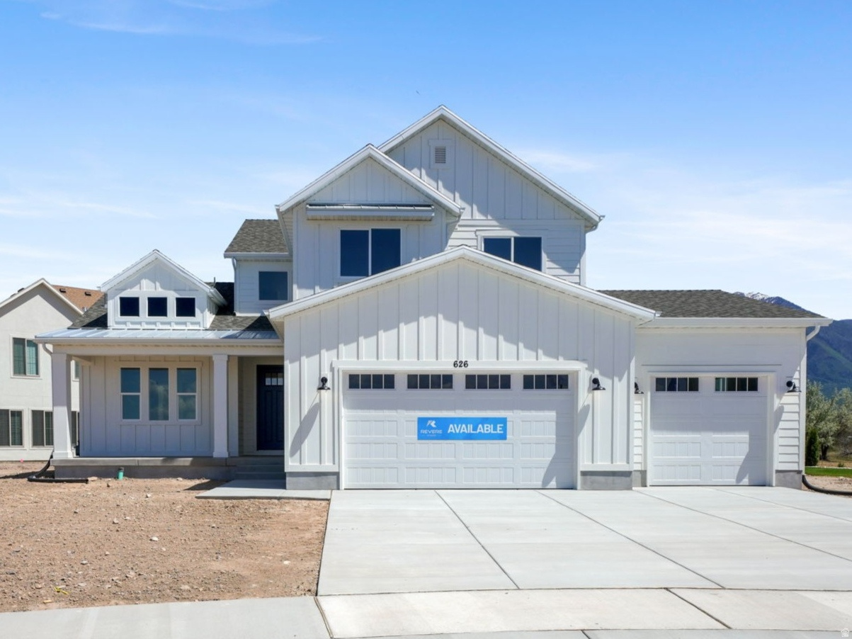 The Midway by Revere Homes |. Where modern design meets everyday comfort in beautiful Davis Farms, one of Utah Valley's premier communities. Located in a highly sought after, family friendly neighborhood.  This modern farmhouse offers luxury finishes and thoughtful design throughout. The home features a stunning kitchen including high end finishes, and a layout built for gathering and entertaining. Bright, open living spaces, statement windows with a stunning view of the Wasatch Mountain Range.  Large picture windows and abundant natural light create a warm, inviting feel. Potential ADU in the basement with a covered walk out, enjoy access to the Grimes Pond Trail System. This is a beautiful location in a great area with panoramic views and great connectivity.  The perfect combining of modern farmhouse style, luxury living, and a premier Davis Farms Salem, Utah Location!  3% in concessions available with the use of builders preferred lender.
