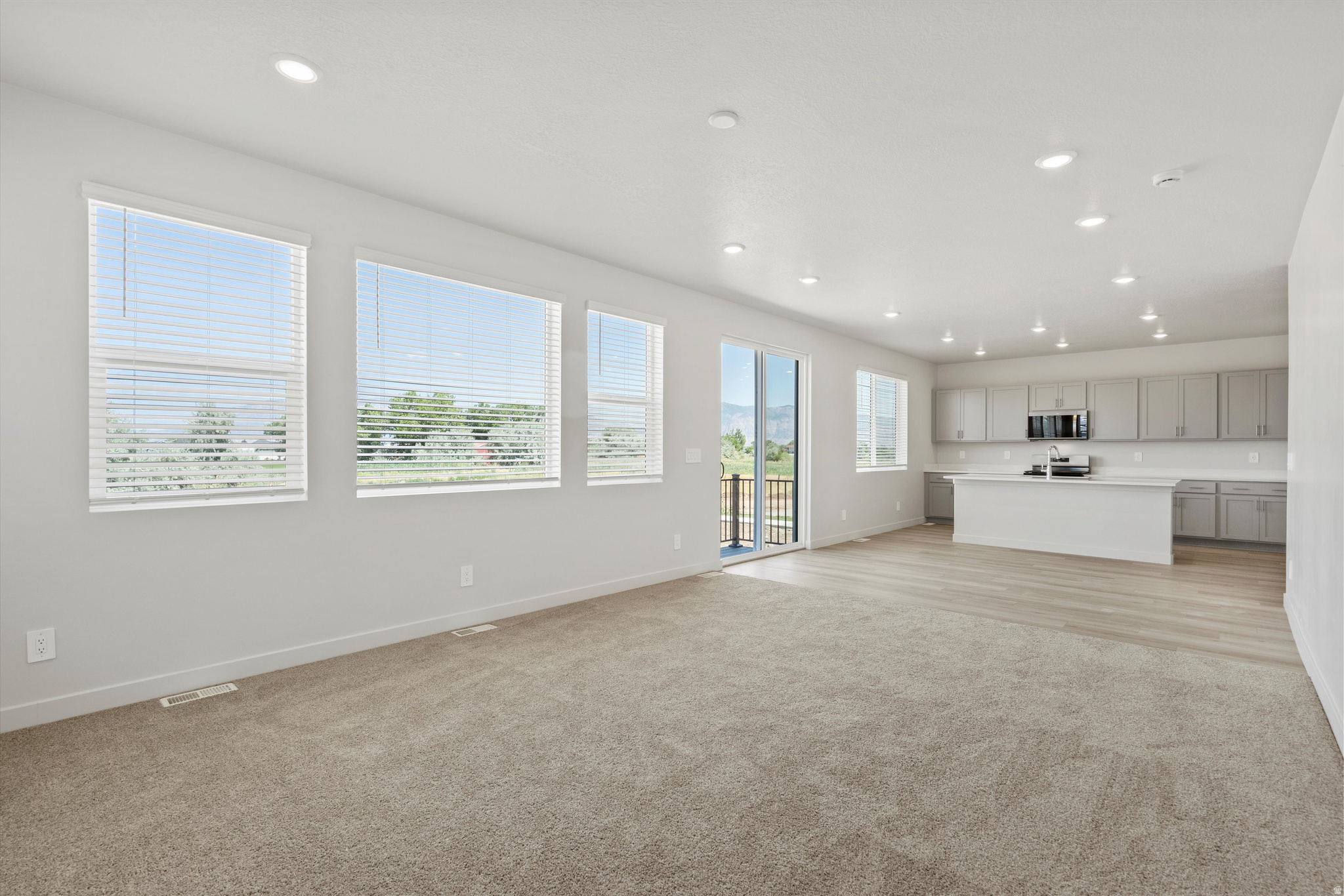 This home's cohesive great room, dining room, and kitchen make entertaining easy, while an unfinished basement adds extra space and future potential. Upstairs, unwind in the primary suite with a walk-in closet. Move in ready with a washer, dryer, fridge and blinds throughout! Total home approx. sq. ft. 3,411.
