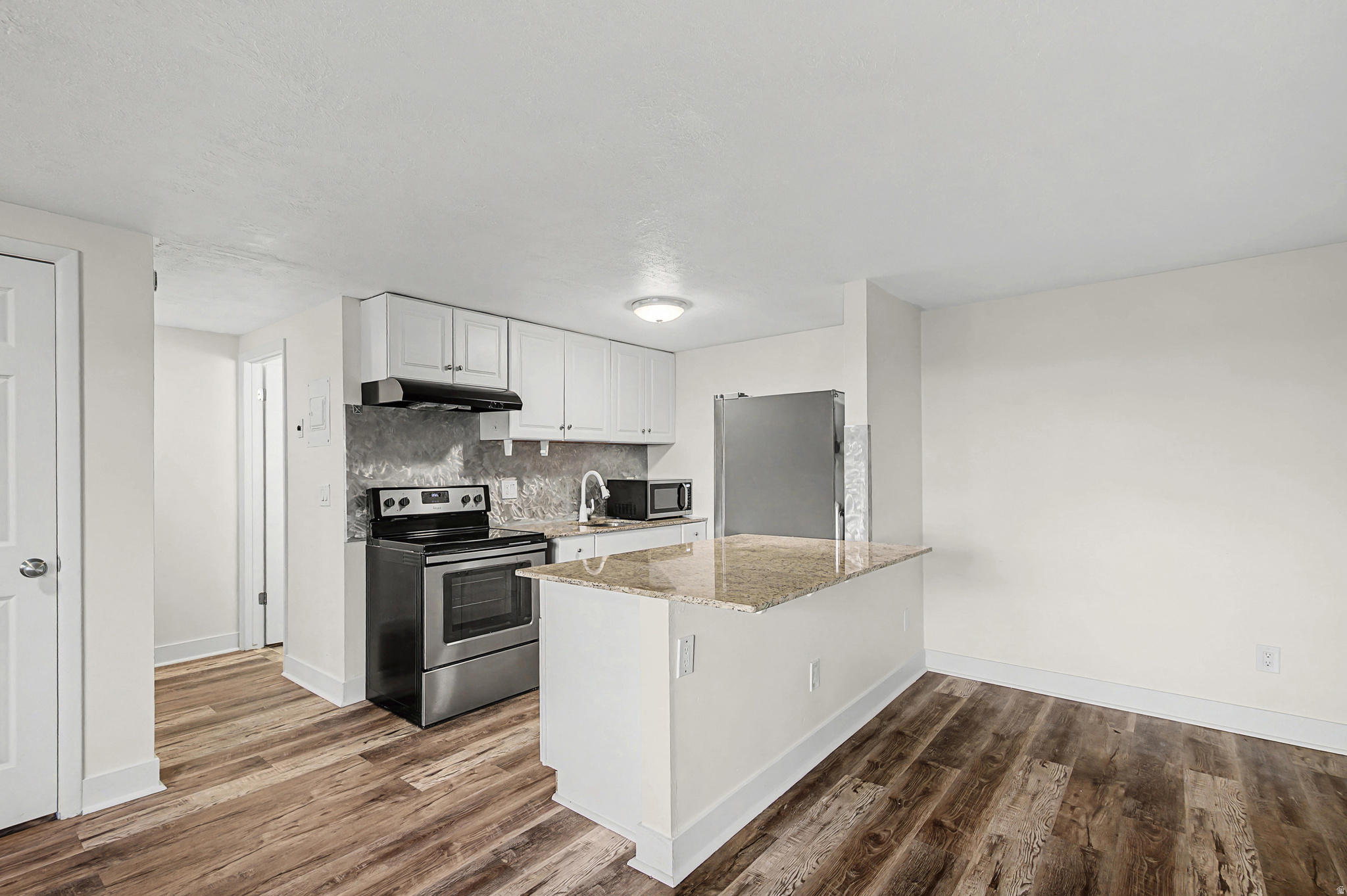 This first floor well kept unit features updated flooring, an improved kitchen with modern touches, and convenient inunit laundry. The open living area offers great natural light, and the bedroom provides comfortable space and a functional layout. Carport with secure storage area.  A prime location near shopping, dining, and freeway access make this an excellent lowmaintenance home.