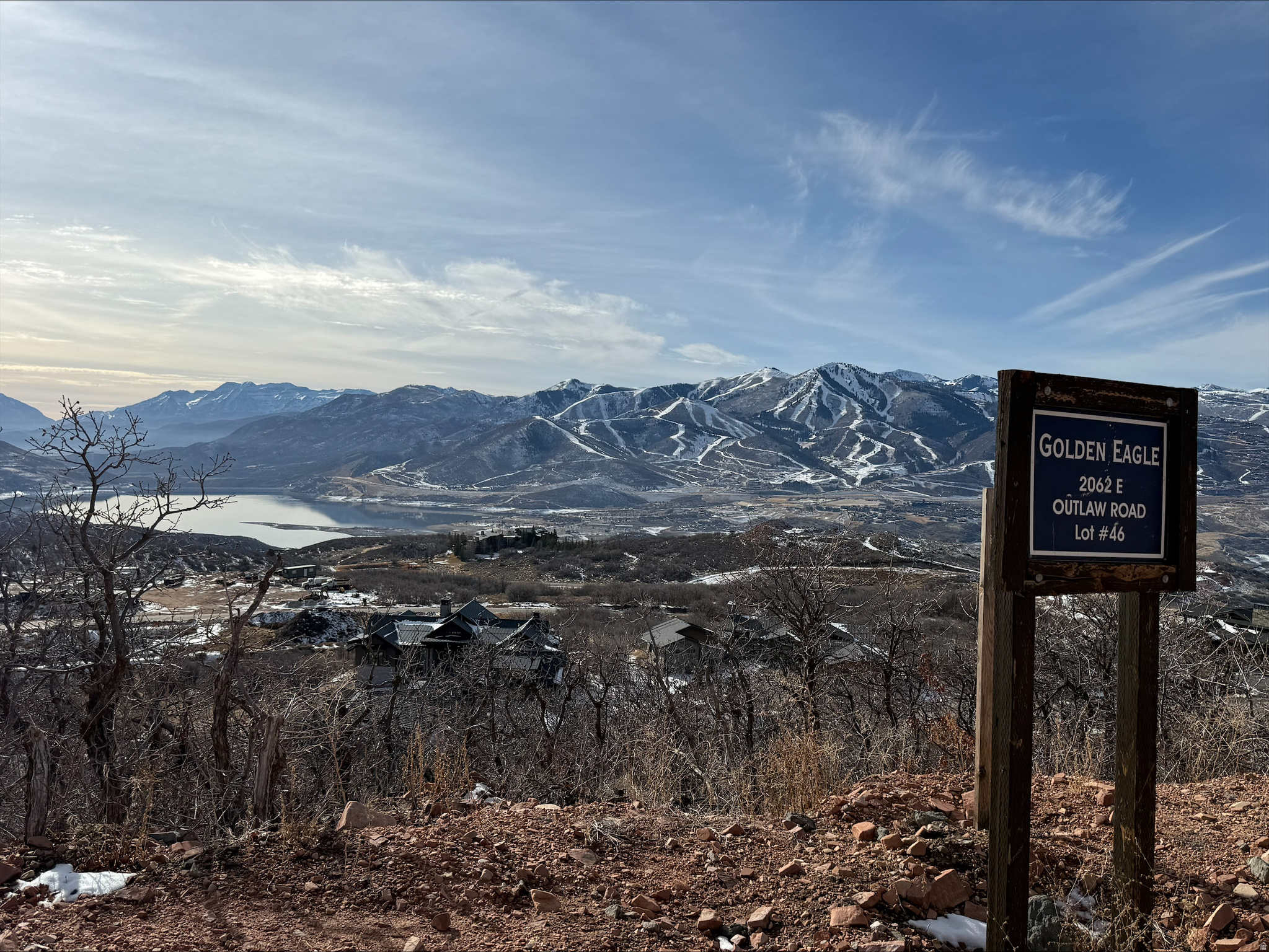3/4 ACRES OF PANAORAMIC, DOWHILL VIEWS ON SIGNATURE GOLDEN EAGLE HOMESITE   This signature view lot is positioned to capture stunning, unobstructed views of Jordanelle Reservoir, the sky-high peaks of the new Deer Valley East Village, and the iconic Mount Timpanogos.  This is among the largest homesites in Golden Eagle  at 0.78-acres  perched on a downhill, easy-build future mountain homesite of up to 7,000 sq ft.   Golden Eagle encompasses 600 acres, with 25% preserved as open space. Residents enjoy many miles of private trails and a planned clubhouse with indoor/outdoor gathering areas, a kitchen, and a fire pit.  Ideally located just 15 minutes to the new Deer Valley East Village, a short drive to Park City's main street, and only 35 minutes to Salt Lake International Airport, this large lot blends everyday convenience with a truly unrivaled view.