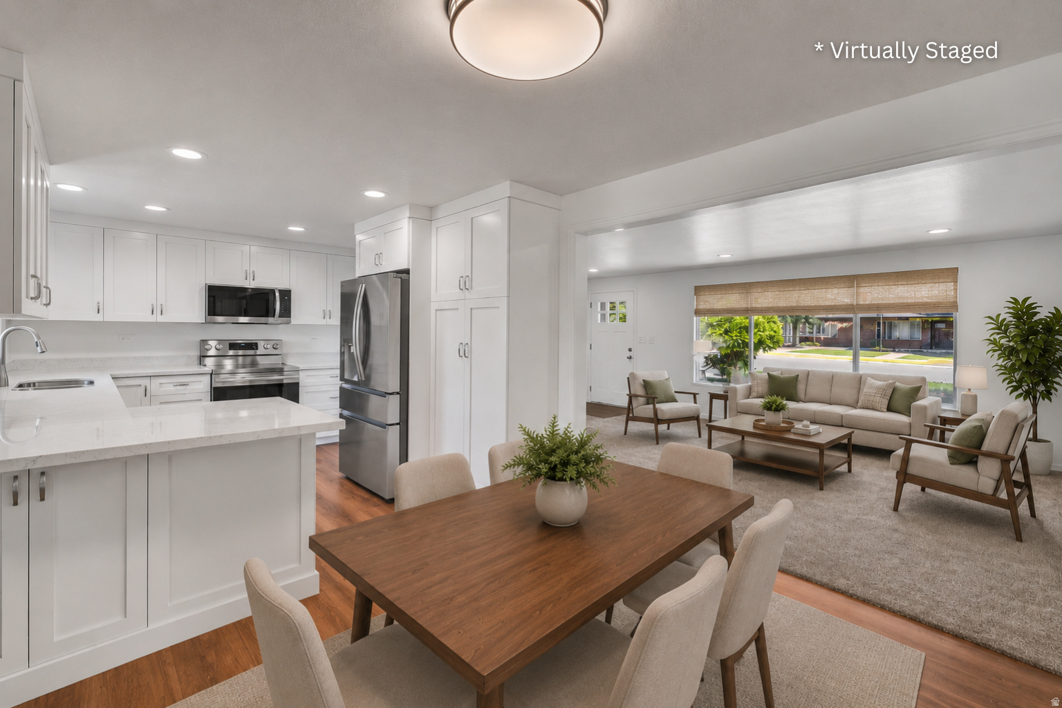 Tastefully remodeled 4-bed, 2.75-bath, just over 2,000 sq ft in Orem's quiet Lakewood Village. Redesigned kitchen with quartz counters & custom cabinets. New LVP flooring, carpet & paint. Enclosed sunroom with panoramic Utah Valley views. Move-in ready! Beyond the main living areas, that enclosed sunroom adds roughly 400 sq ft of flexible space, perfect for workouts, hobbies, or game nights with family and friends. The attached two-car garage, multiple oversized storage areas, and an outdoor shed leave room for everything from sports gear to seasonal decor. Set on a calm street just five minutes from I-15, University Mall, schools, and parks, this home pairs modern comfort with a location that's hard to beat. Schedule your private tour today and see why Lakewood Village homes go fast! Square footage figures are provided as a courtesy estimate only and were obtained from County Record. Buyer is advised to obtain an independent measurement.